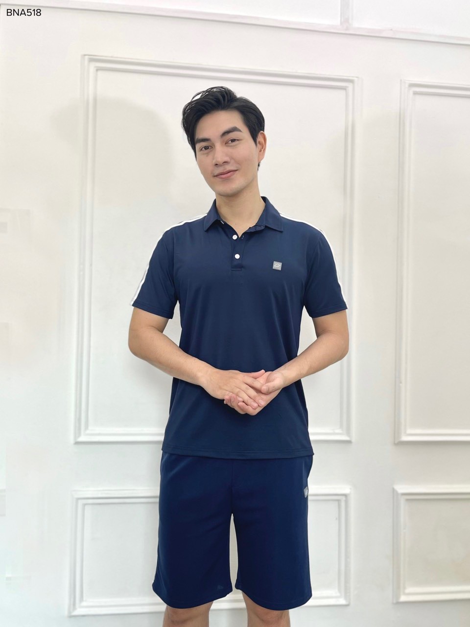 Bộ nam cổ polo phối 2 sọc logo cao su ngực