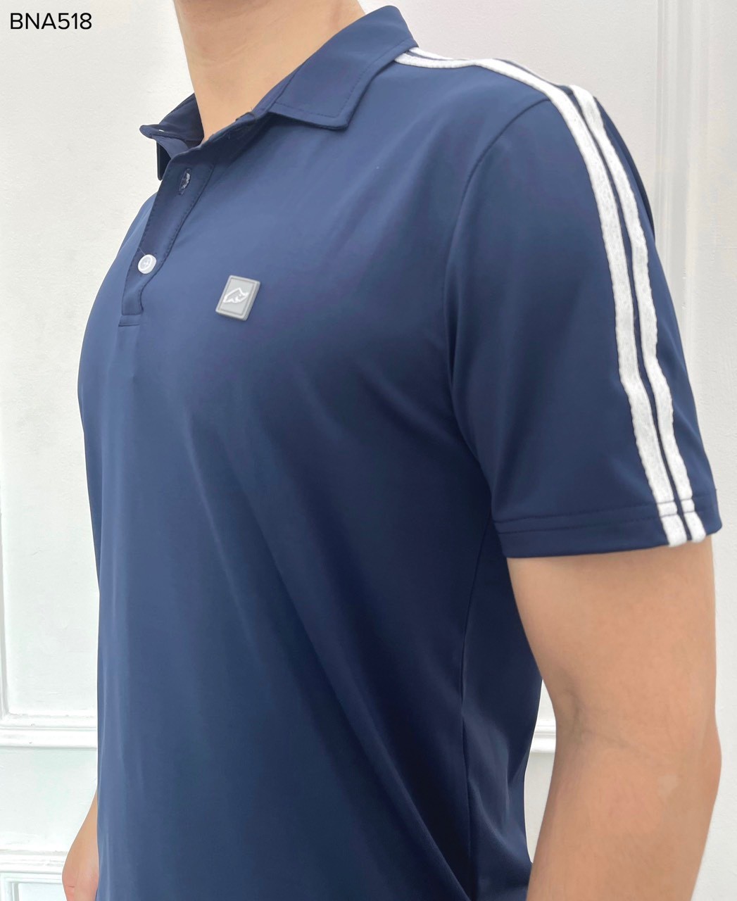 Bộ nam cổ polo phối 2 sọc logo cao su ngực