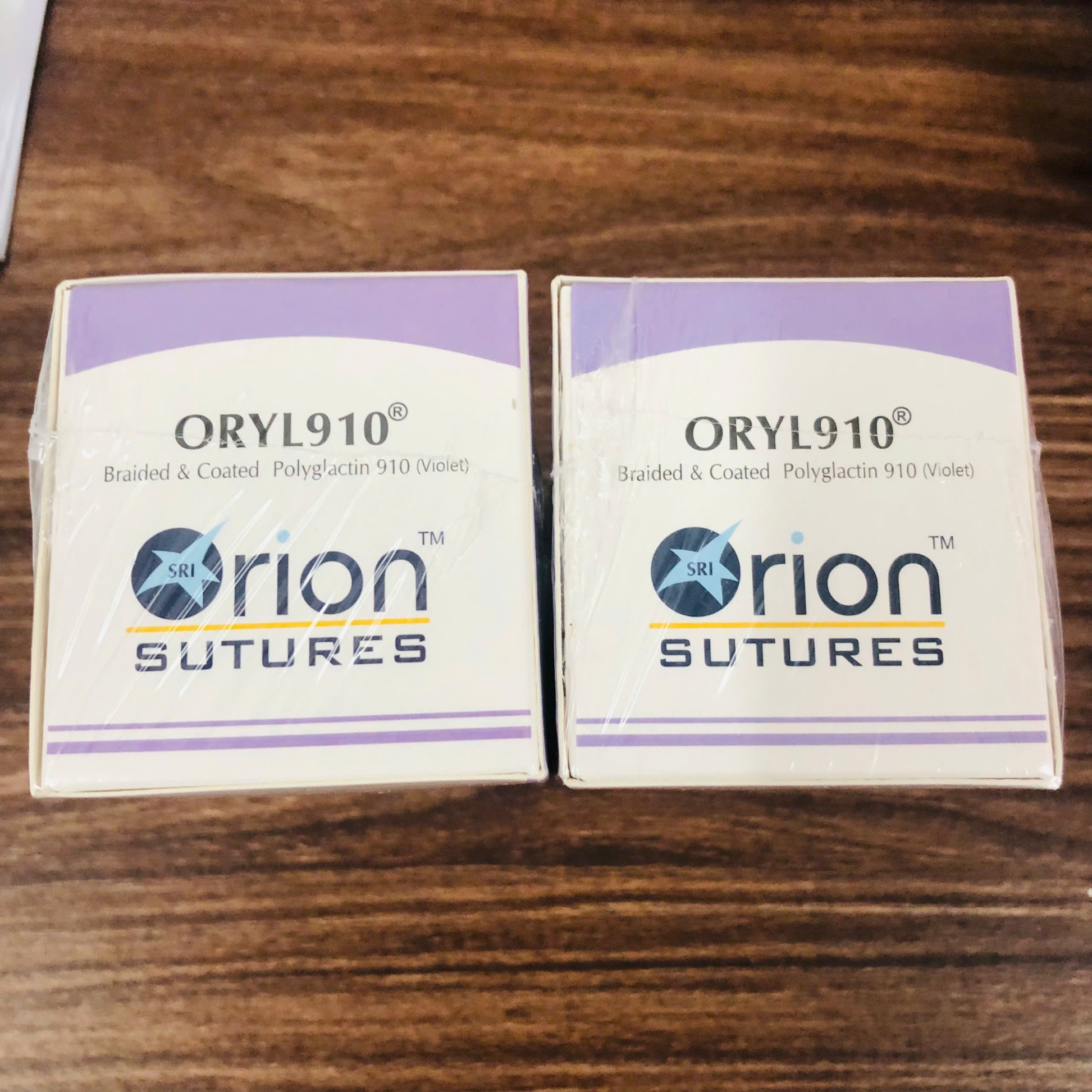 Chỉ tiêu tổng hợp đa sợi Polyglactin số 2, Orion Sutures, Ấn Độ (Hộp=12 sợi)