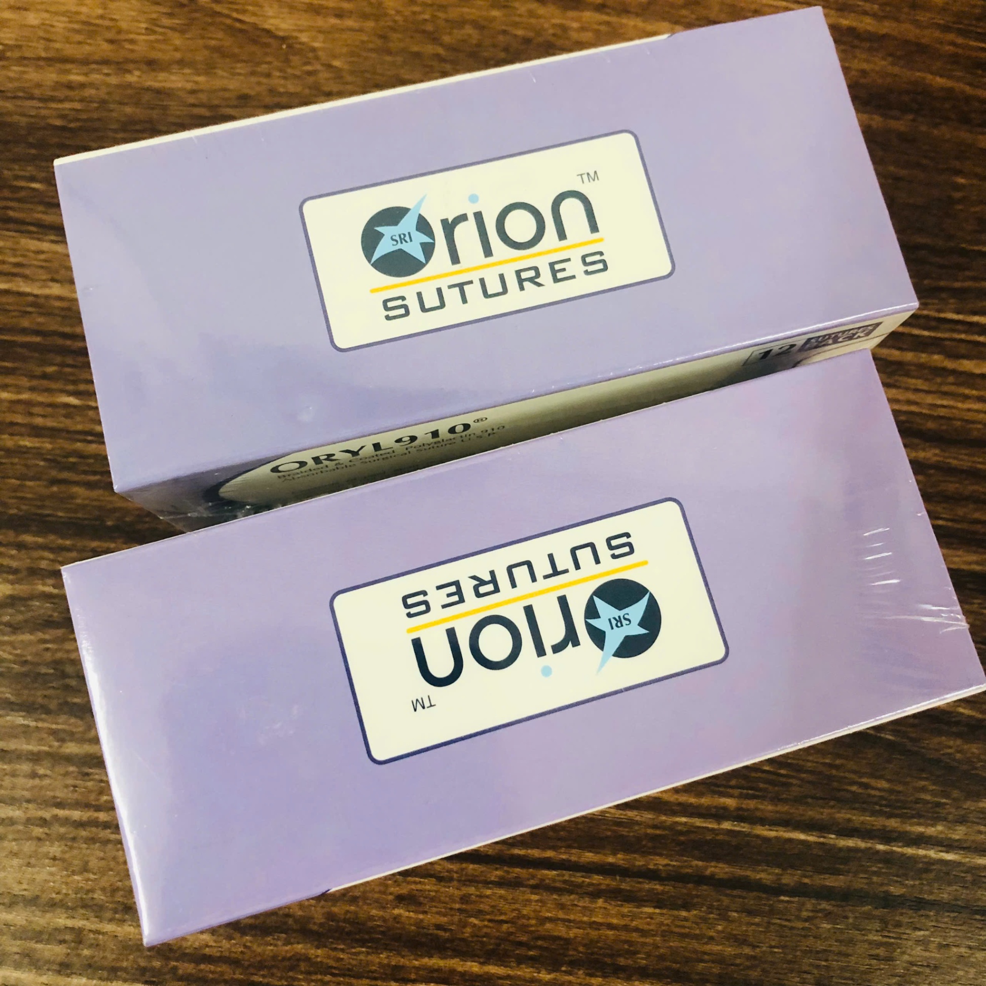 Chỉ tiêu tổng hợp đa sợi Polyglactin số 2, Orion Sutures, Ấn Độ (Hộp=12 sợi)