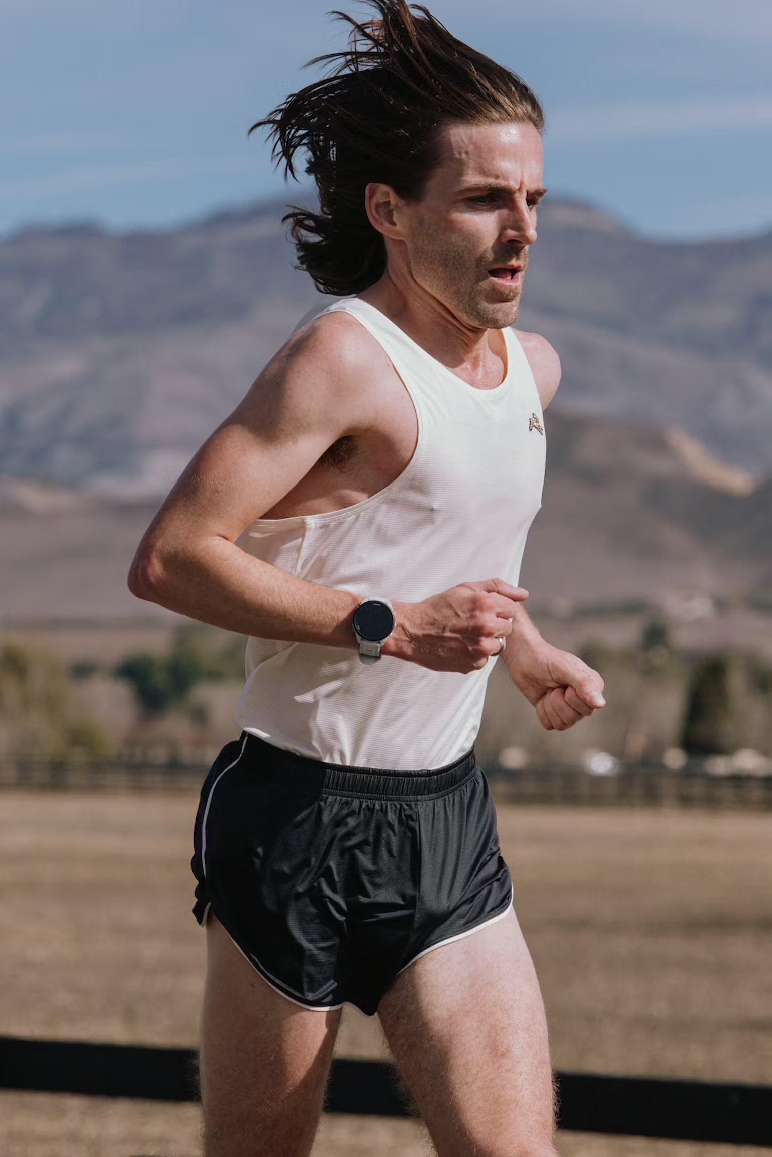 Ao-chay-bo-Tracksmith-Men-s-Twilight-Tank-size-S-11.jpg?v=1778662842