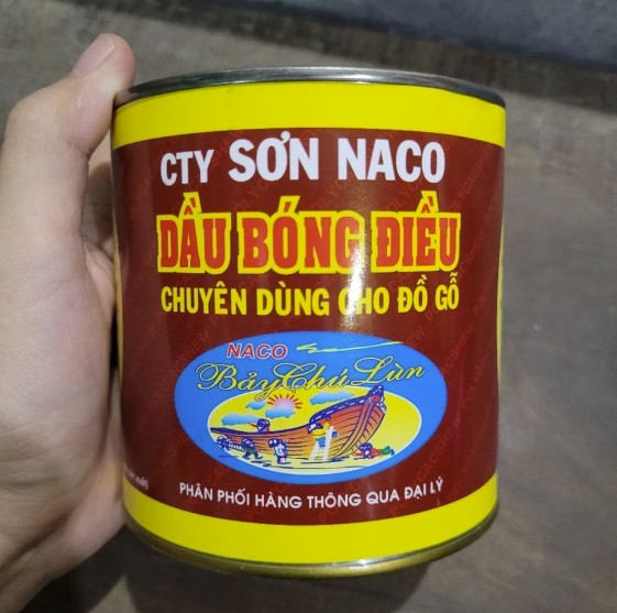 Dầu bóng điều Naco Bảy Chú Lùn màu đen 700ml