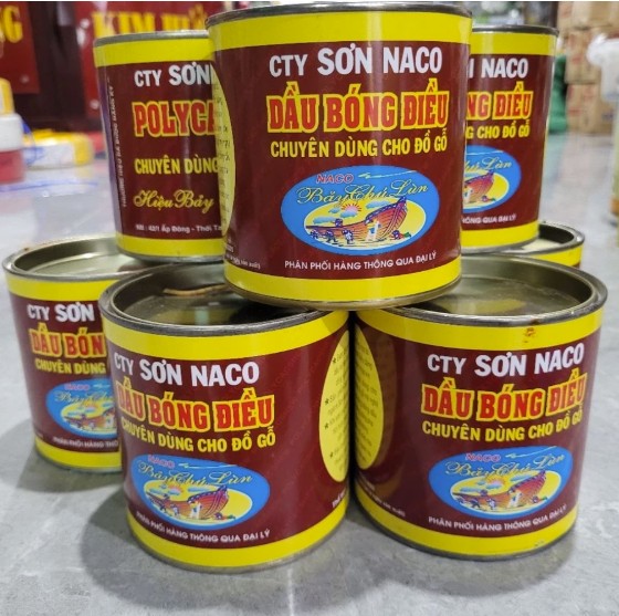 Dầu bóng điều Naco Bảy Chú Lùn màu đen 700ml