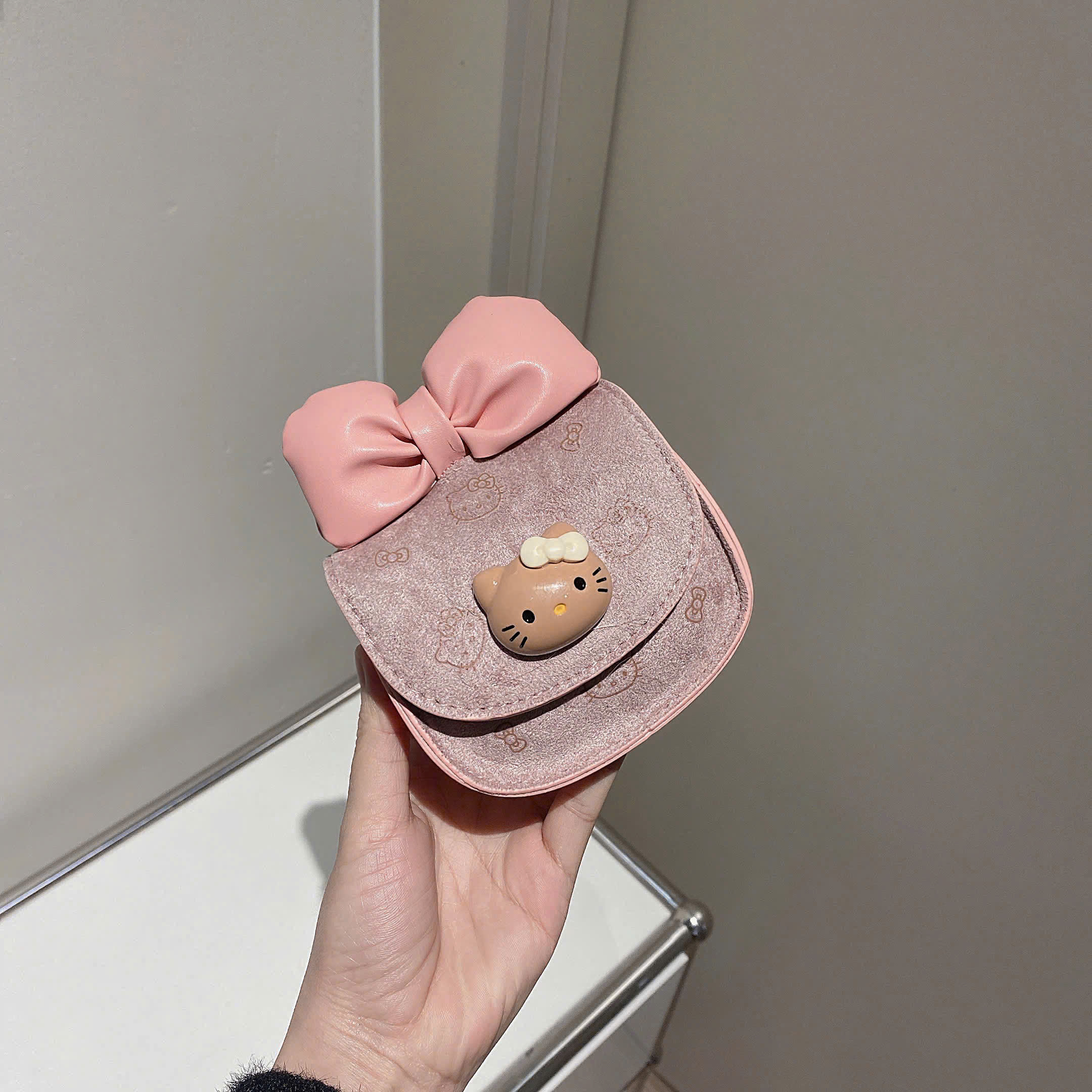 9903# Túi Hello Kitty nơ mini