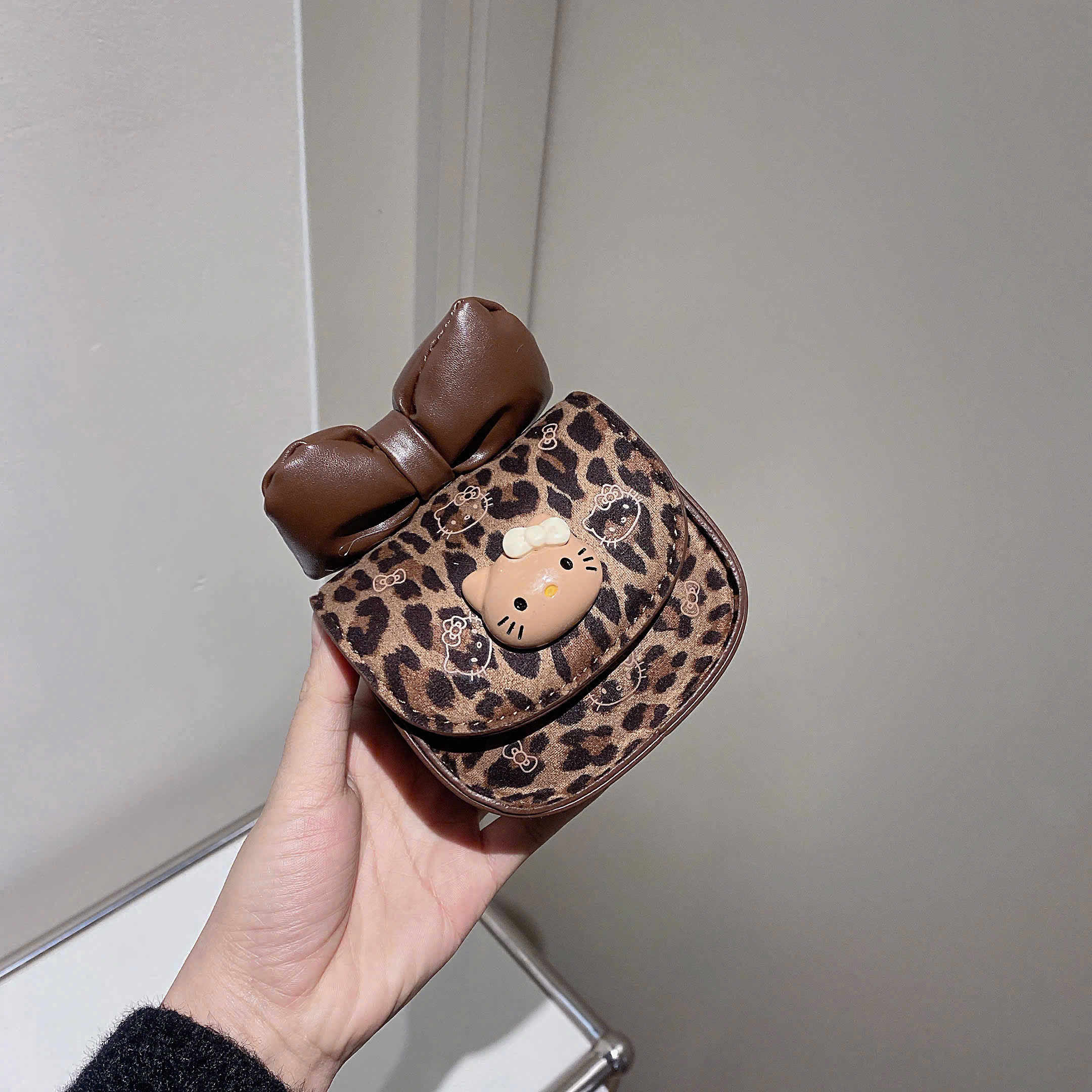 9903# Túi Hello Kitty nơ mini