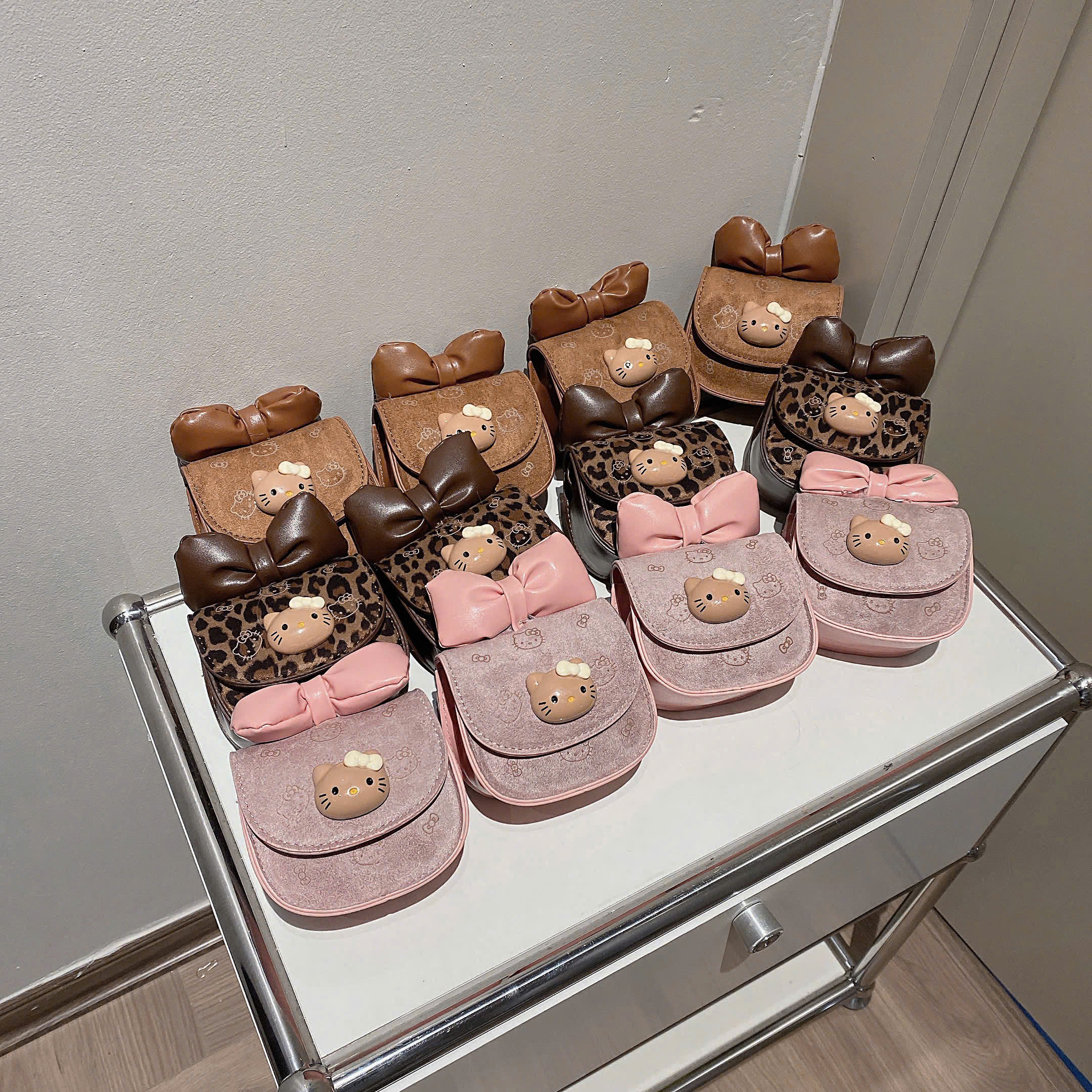 9903# Túi Hello Kitty nơ mini