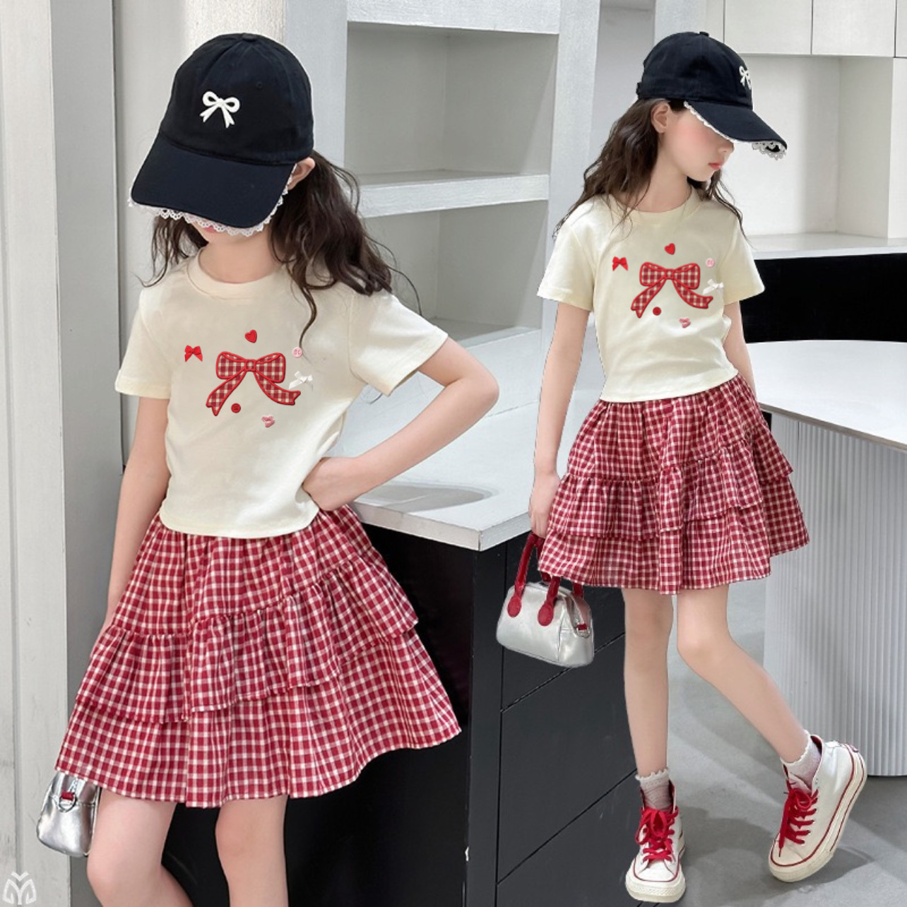H26068-Set áo in nơ kèm chân váy caro M342