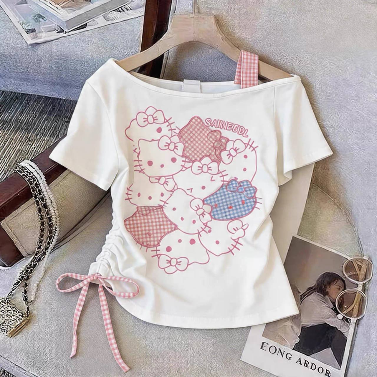 H26086-Áo kitty nhỏ vai lệch mix dây caro M353