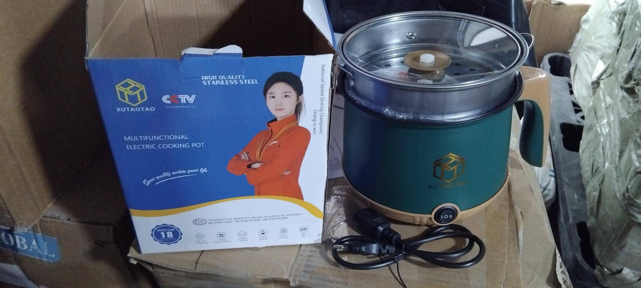 Nồi lẩu điện đa năng XuTaotao 18cm kèm vỉ hấp inox Tmark (Kiện 48 cái)