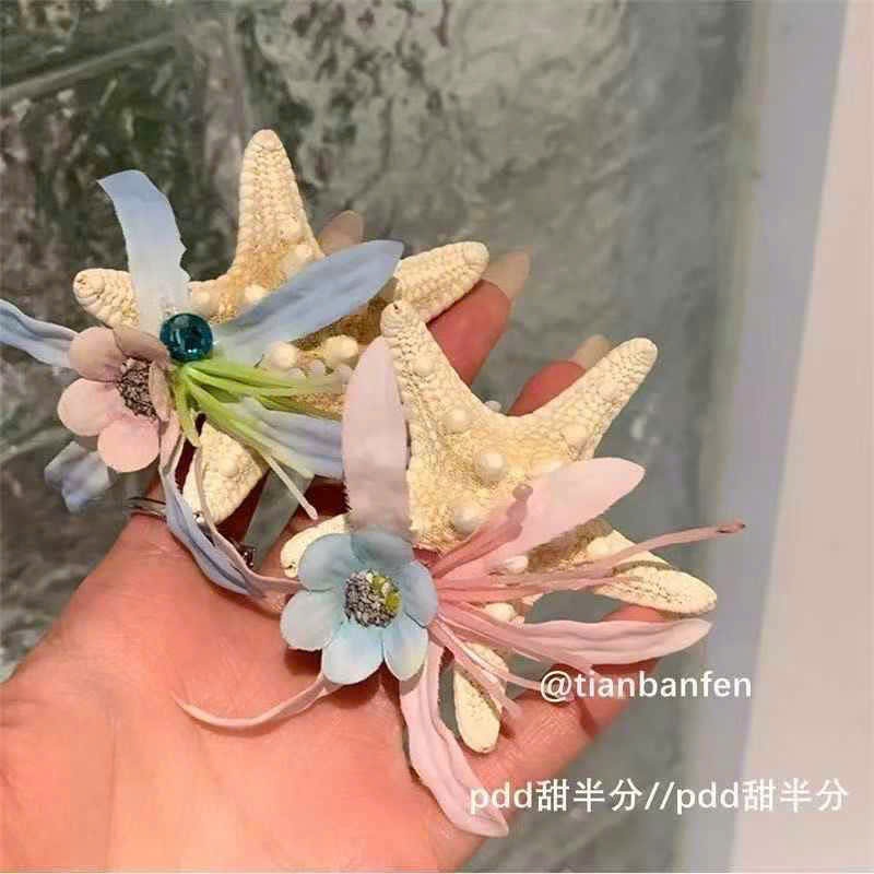 Kẹp tóc sao biển gắn hoa ( kiện 50) ( hàng nguyên kiện)
