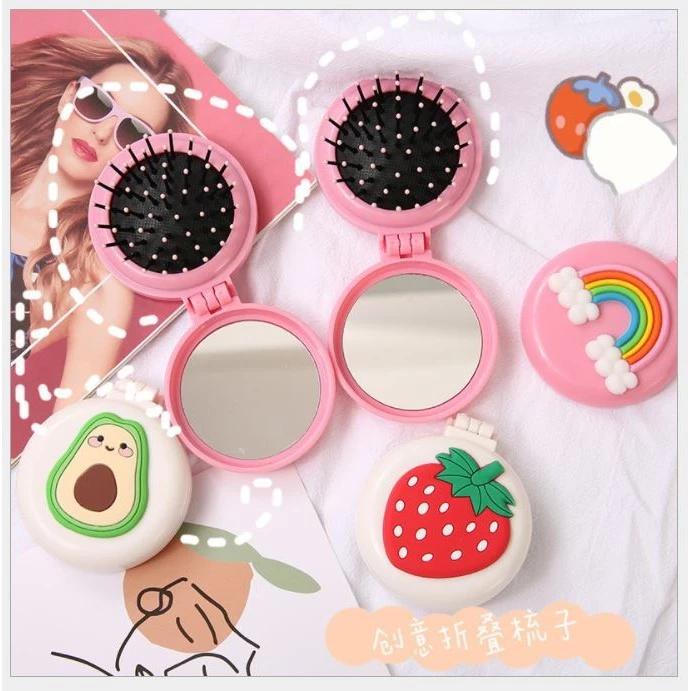 Guong-luoc-chai-toc-gap-gon-sieu-cute-Tmark-Loc-20-cai-Kien-300-cai-_Gương lược chải tóc gấp gọn siêu cute Tmark (Lốc 20 cái – Kiện 300 cái).jpg