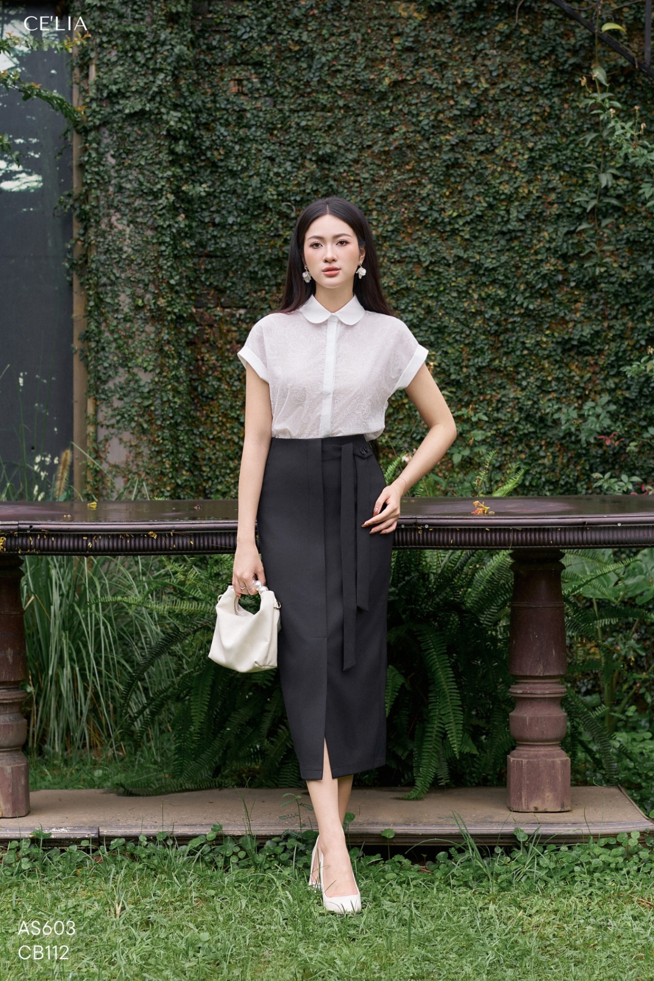 Chân váy nơ sườn 2 cúc