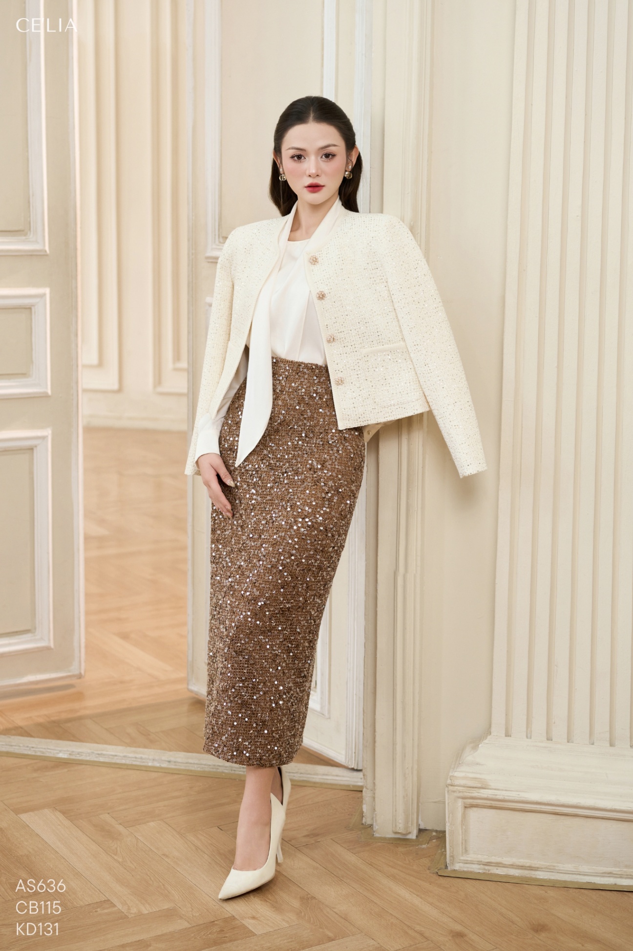 Khoác tweed kim sa cúc đá