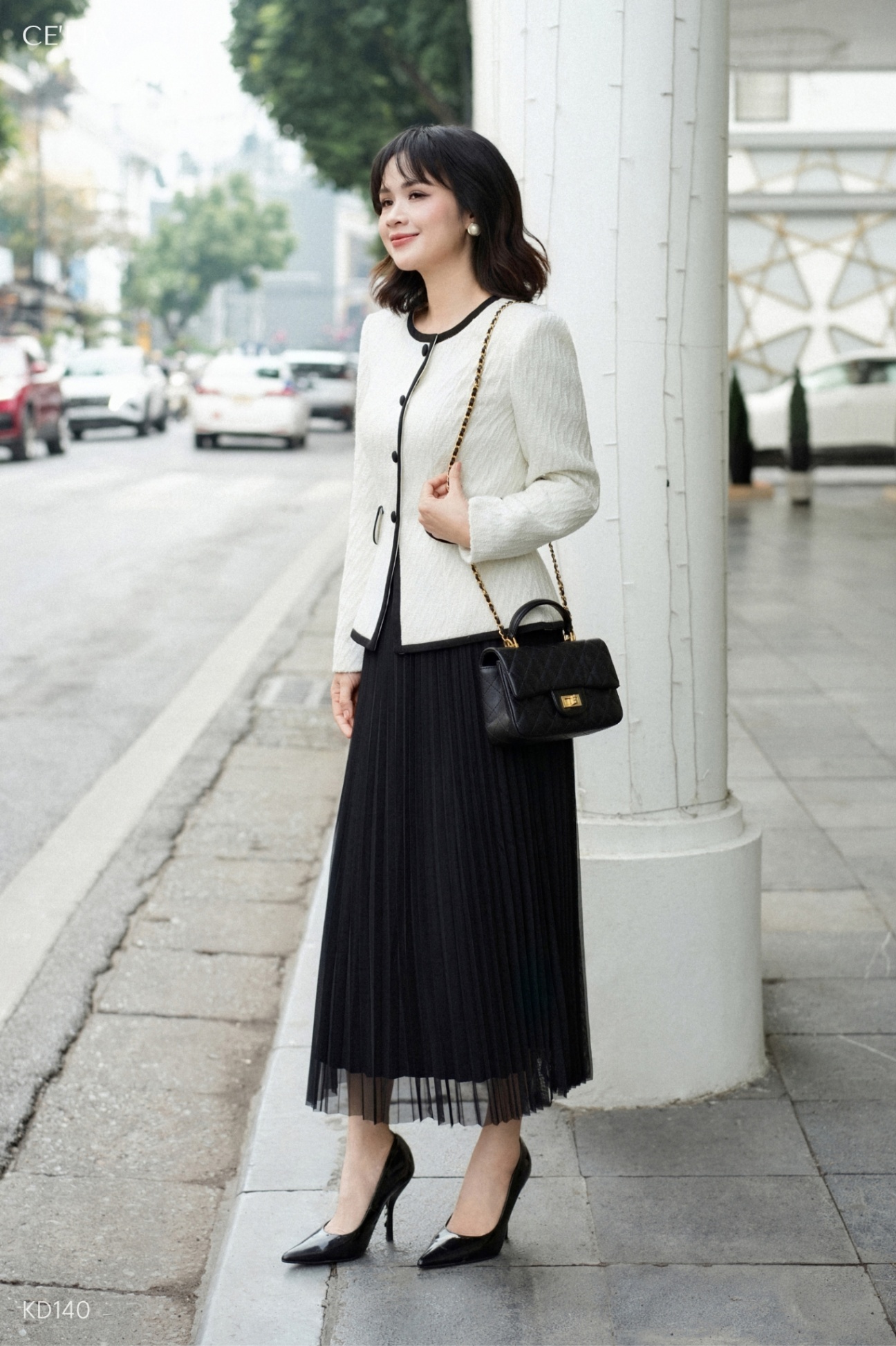 Áo tweed peplum viền đen