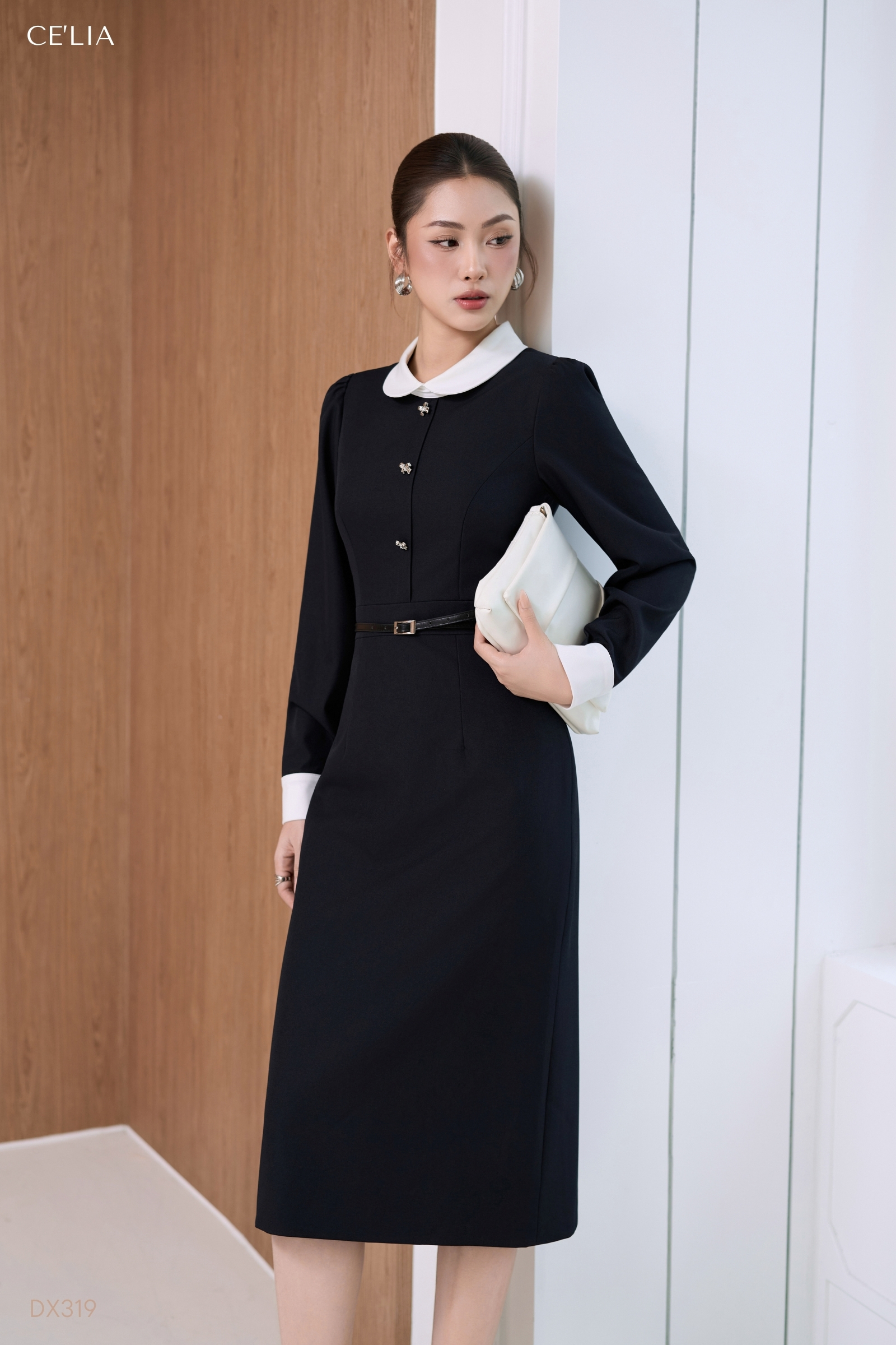 Đầm cổ tròn đính nơ phối