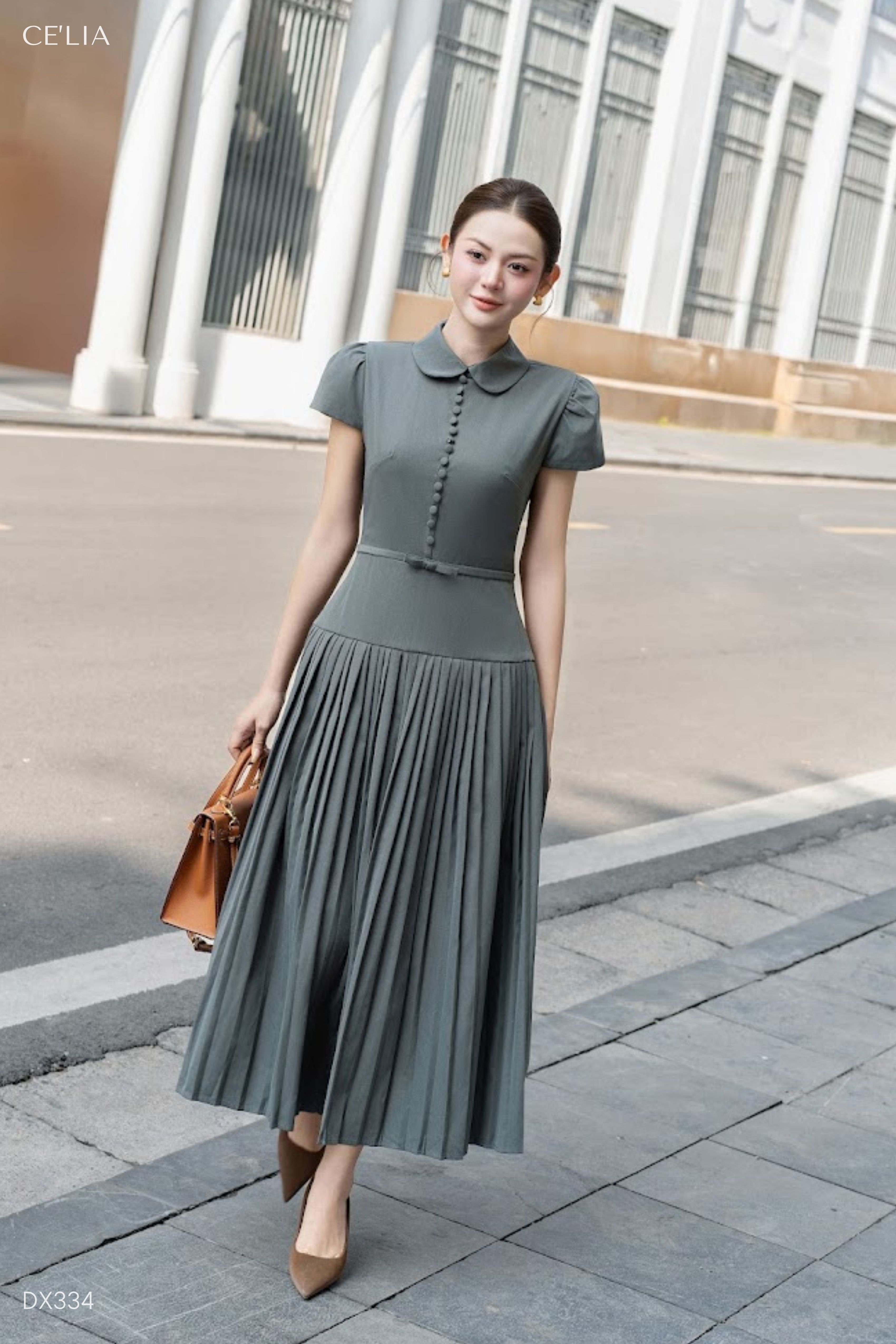Đầm xoè dập ly đai eo