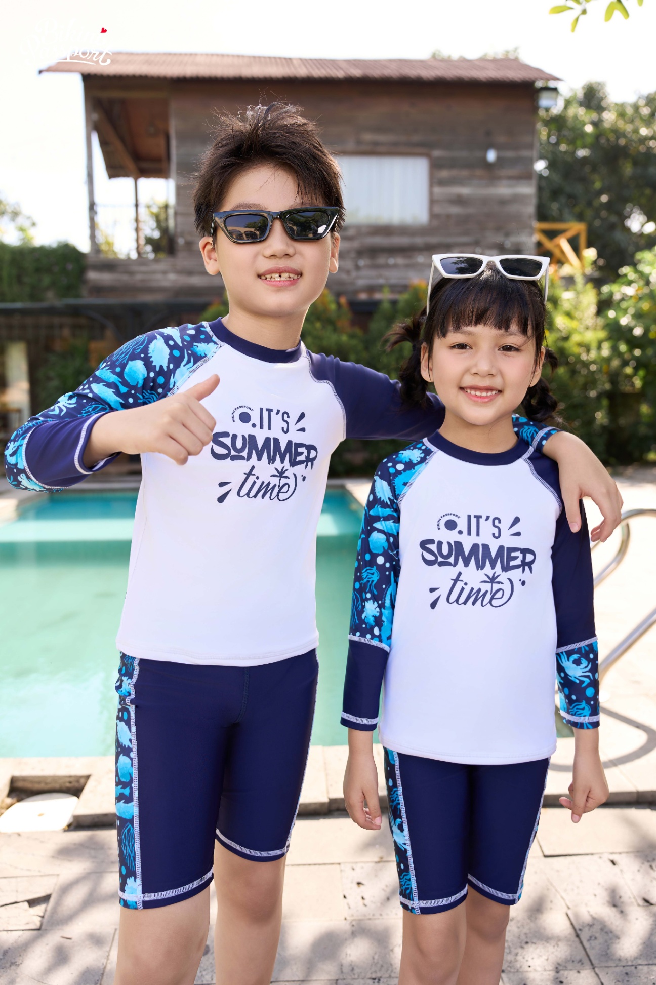 Đồ bơi Unisex cho bé dạng quần lửng, áo có tay - Xanh Họa tiết