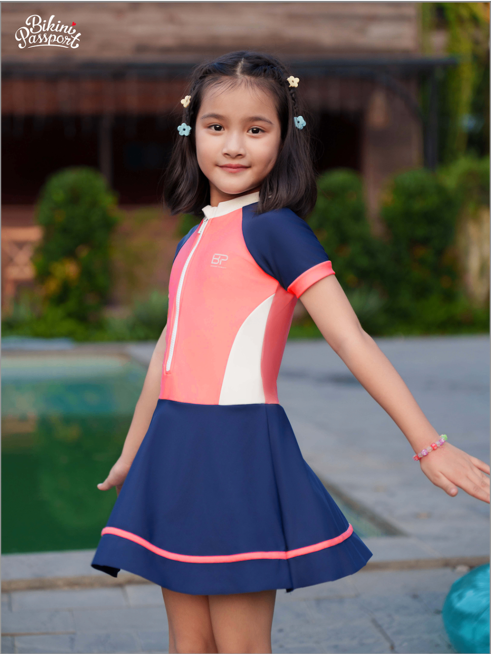 Đồ bơi bé Gái dạng váy áo tay ngắn, có khóa - Hồng