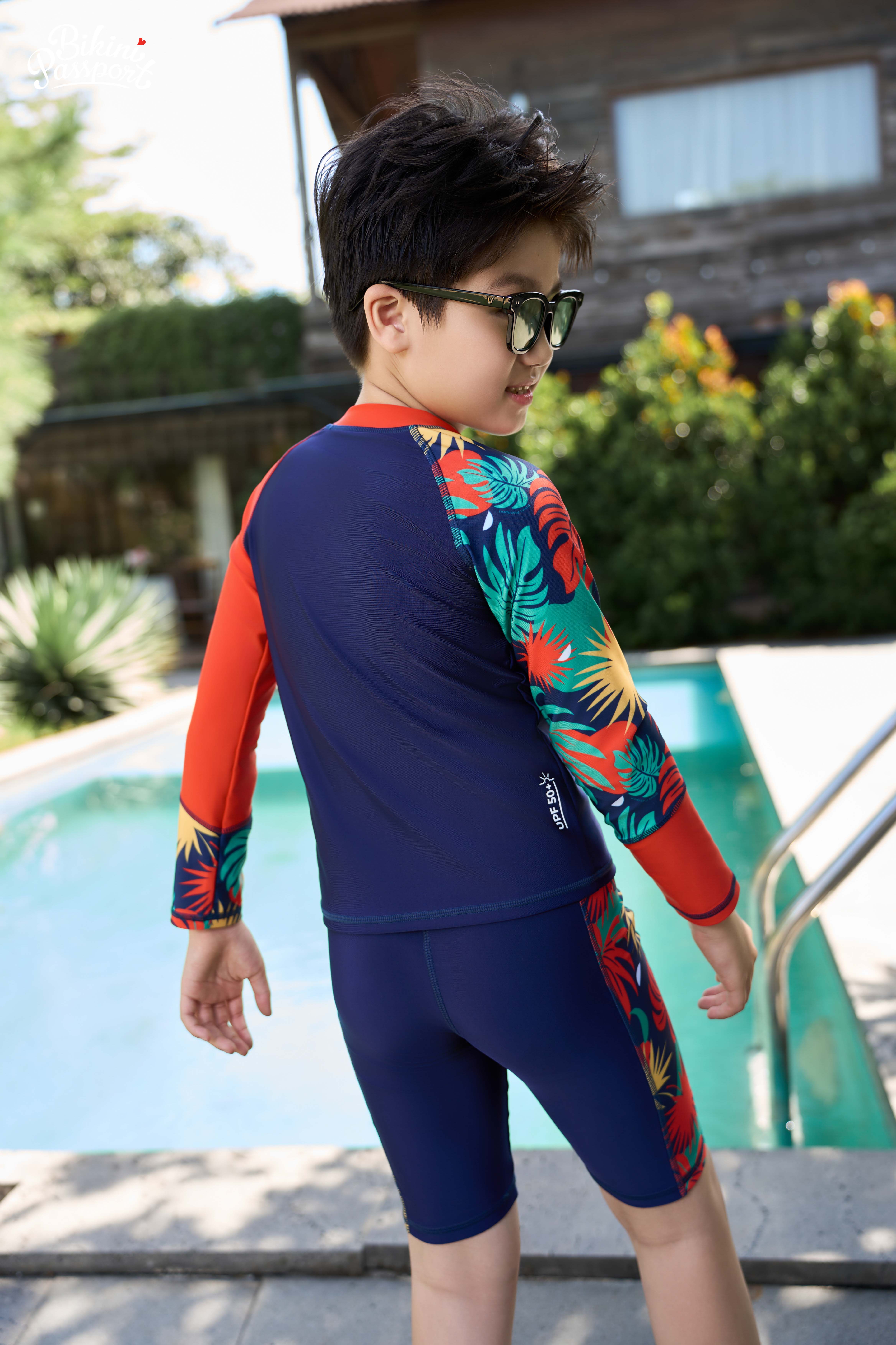 Đồ bơi Unisex cho bé dạng quần lửng, áo có tay - Cam Họa tiết