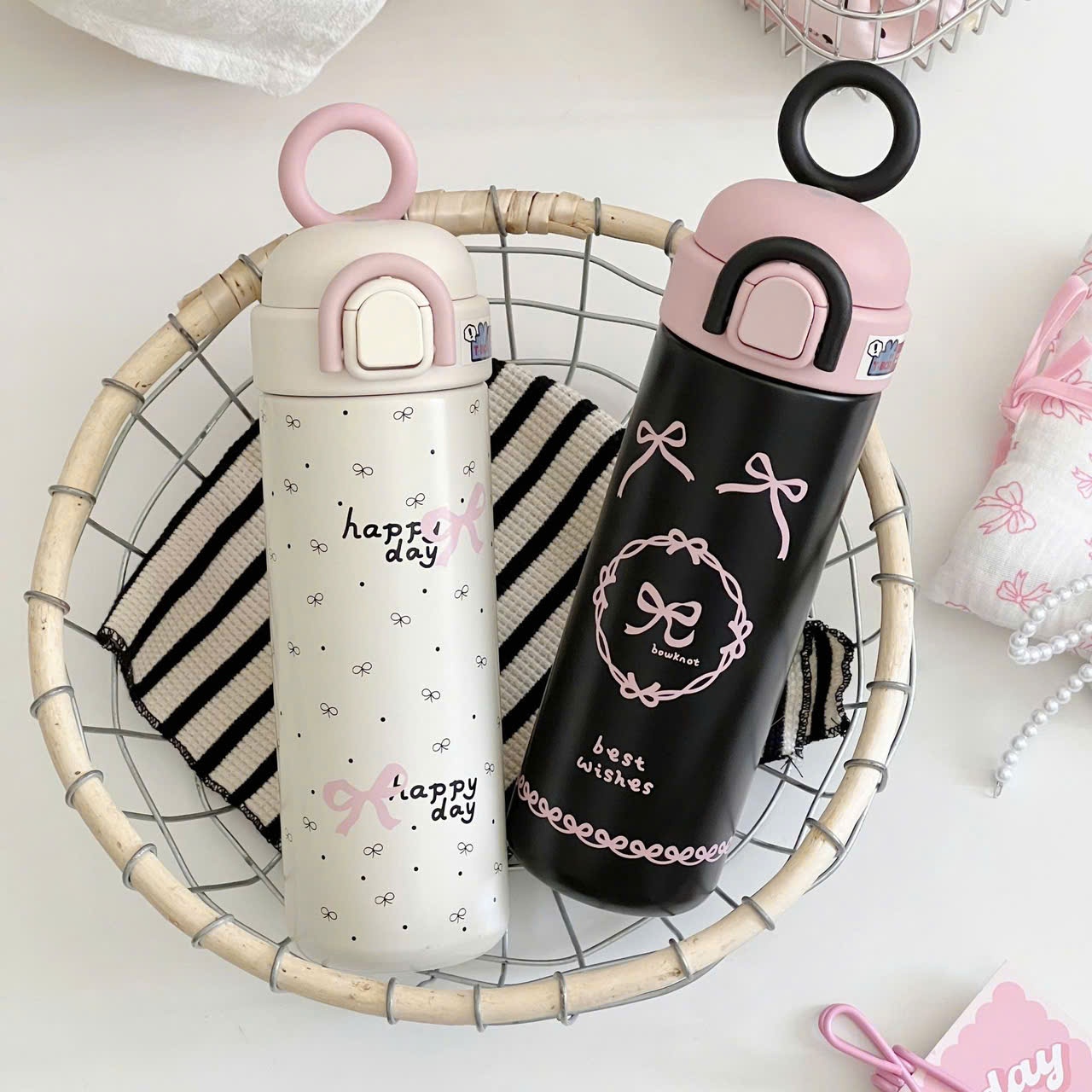 Bình nước giữ nhiệt hình nơ đen hồng