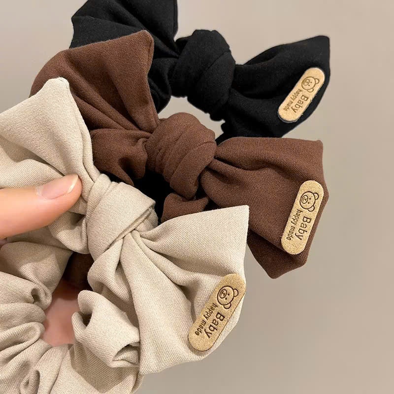 scrunchies vải thắt nơ đính tag gấu
