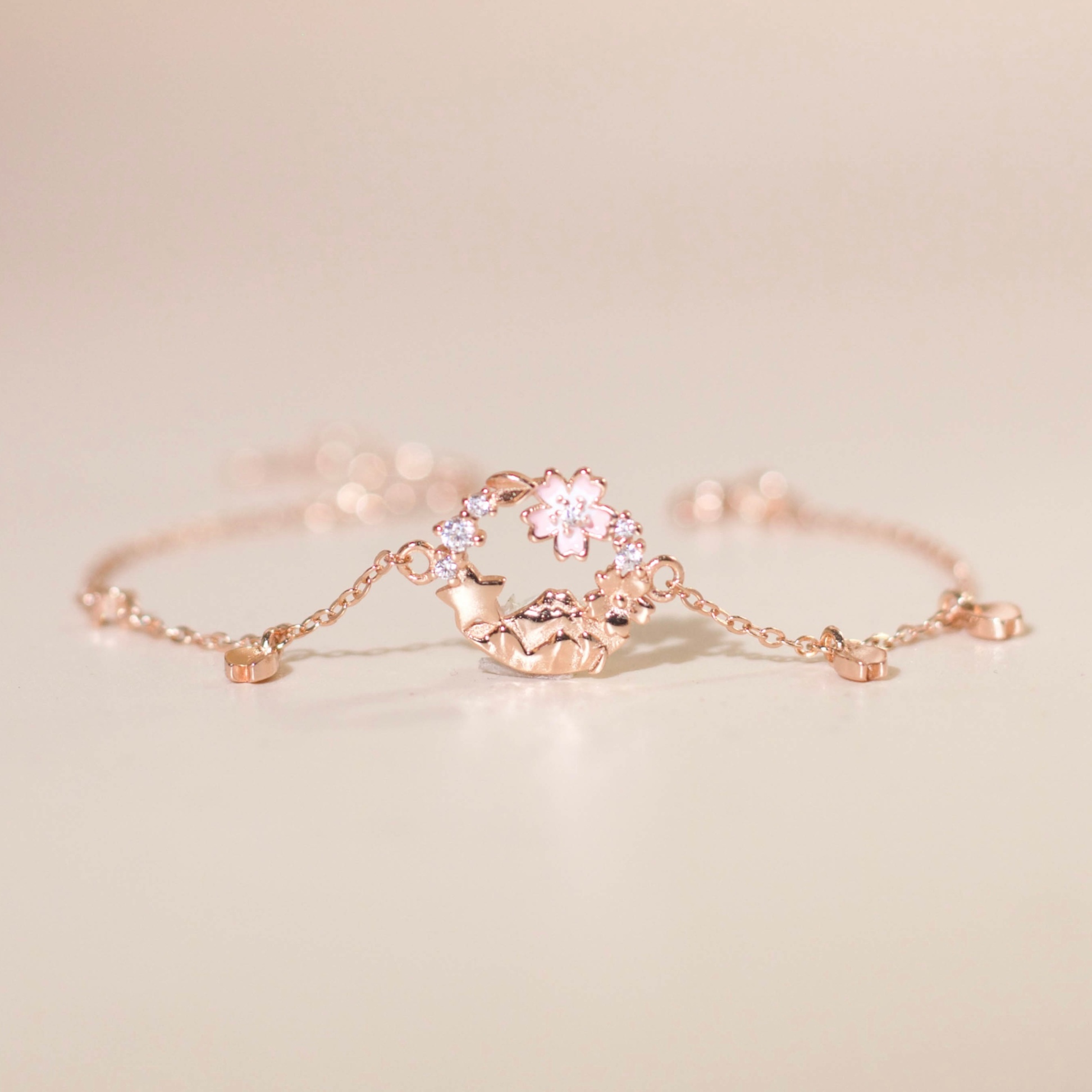 Lắc tay bạc nữ mạ vàng hồng 18K và mạ bạch kim LAVESTA LAV133 Cherry bloom thiết kế mặt hoa anh đào mang sức sống mới