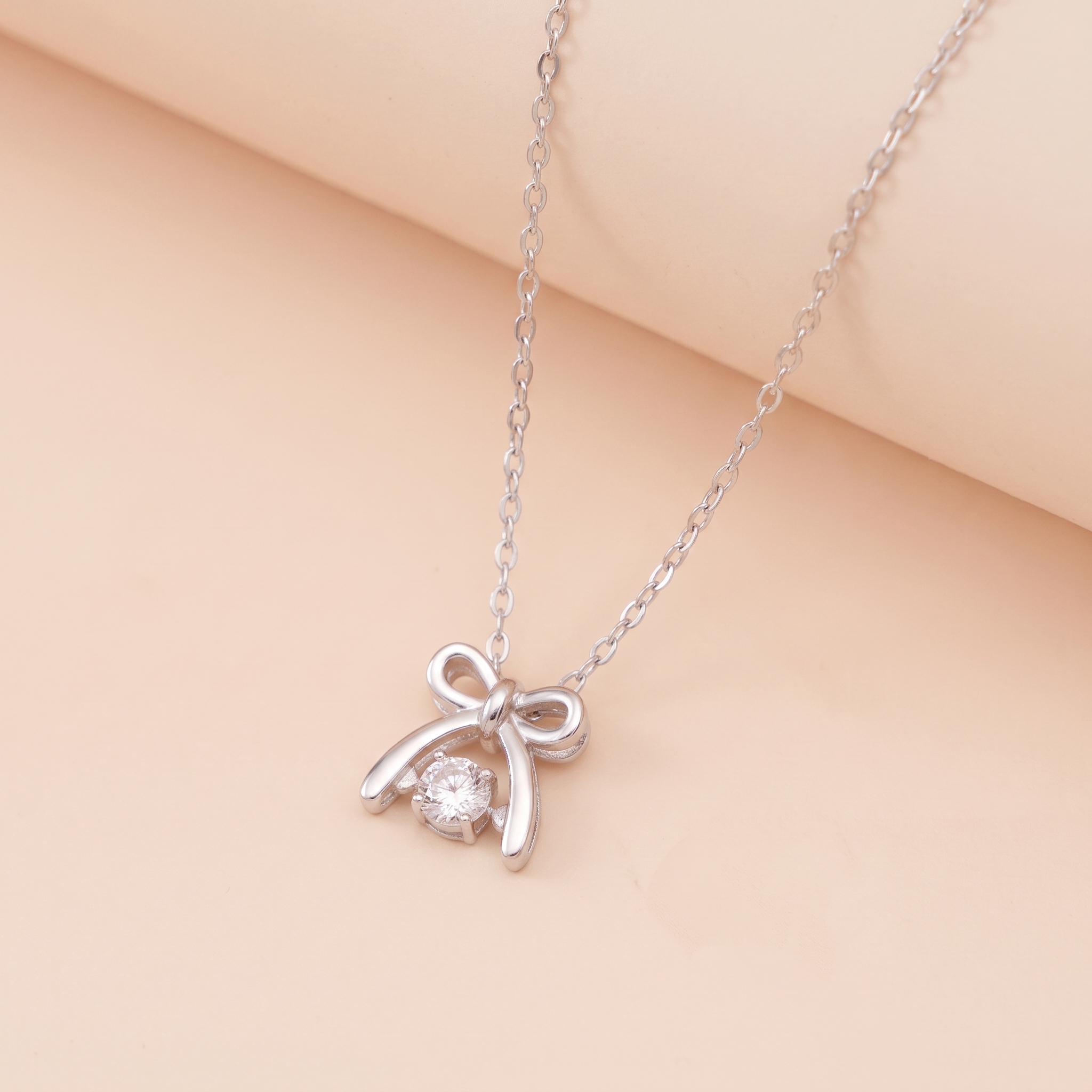 Dây chuyền bạc nữ mạ vàng hồng 18K và bạch kim cao cấp LAVESTA LAV237 Mirin thiết kế nơ mang vẻ đẹp nữ tính và dịu dàng