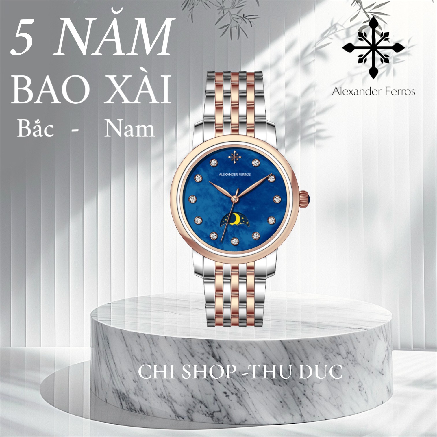 Đồng hồ nữ Alexander Ferros 9322D/05 – Moonphase máy pin, niềng trơn, mặt xanh 33mm, kính Sapphire, dây kim loại