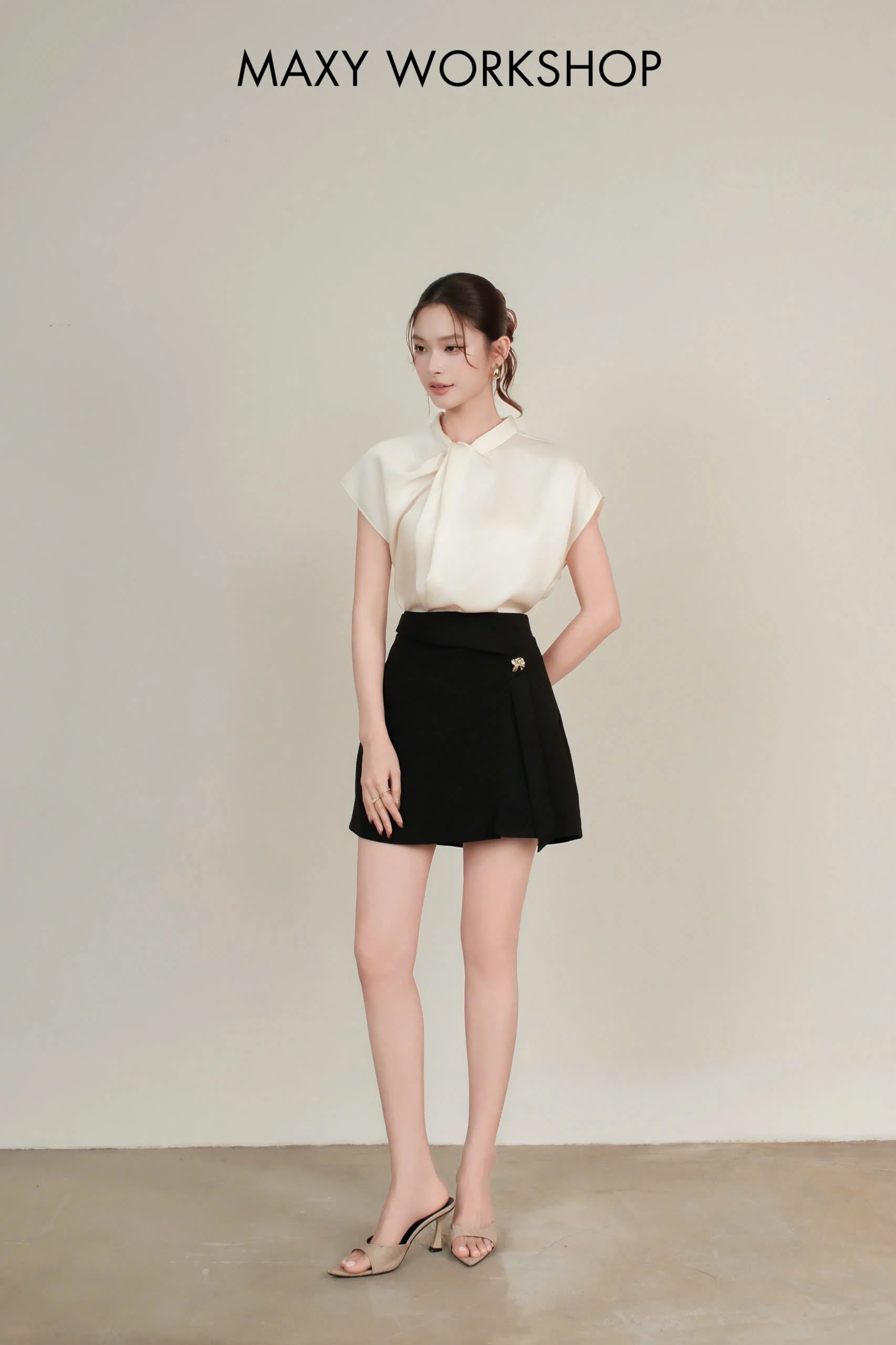 Chân váy ngắn FRONT BUTTON SKIRT