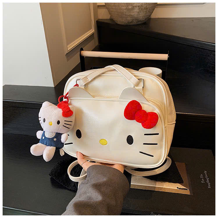 B221 - BA LÔ KITTY DA BÓNG KÈM CHARM