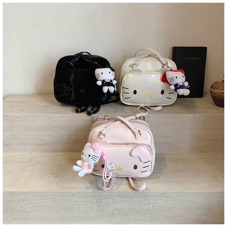 B221 - BA LÔ KITTY DA BÓNG KÈM CHARM