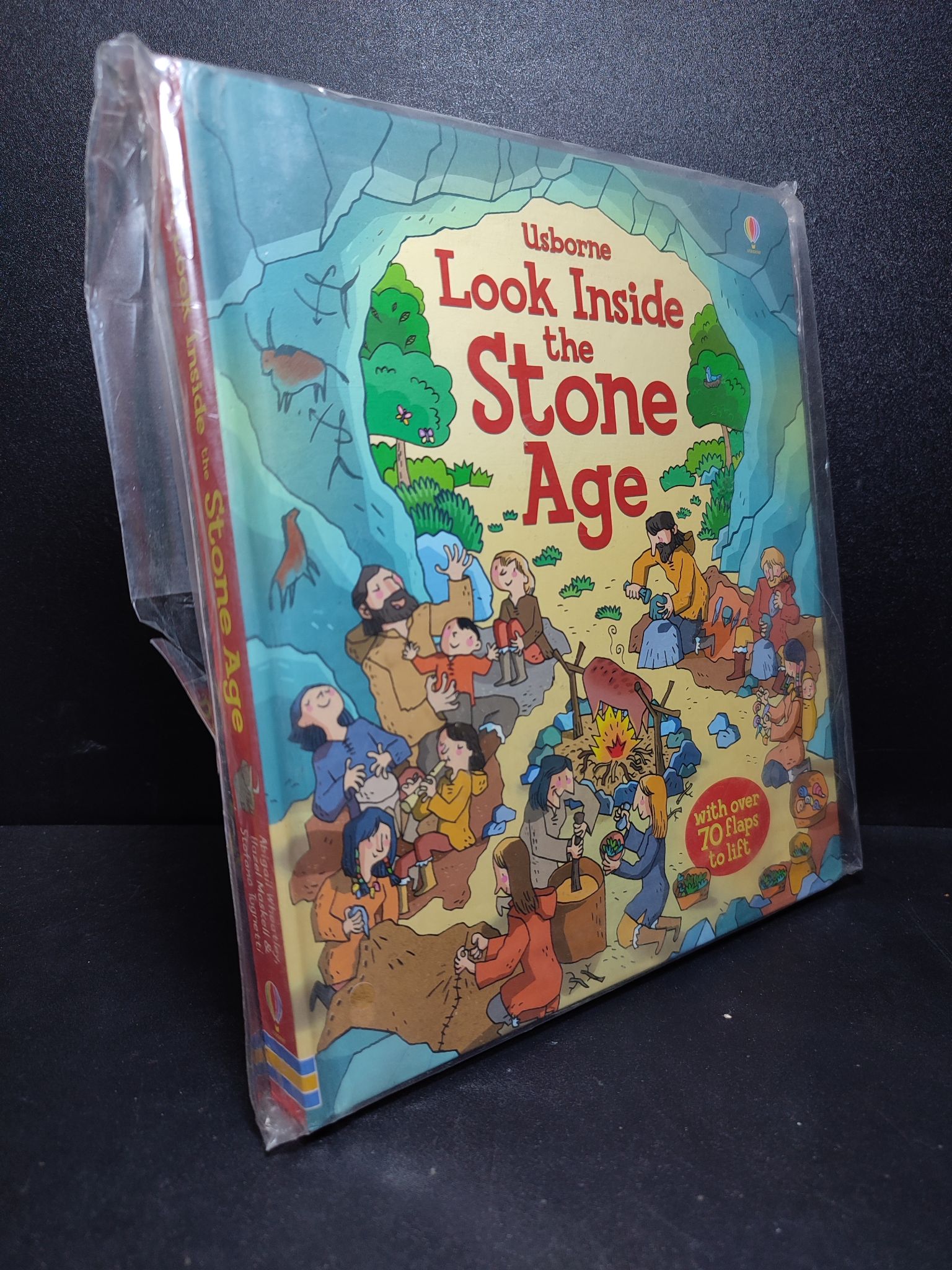 Usborne Look Inside the Stone Age Abigail Wheatley, Hazel Maskell & Stefano Tognetti mới 90% HCM1810