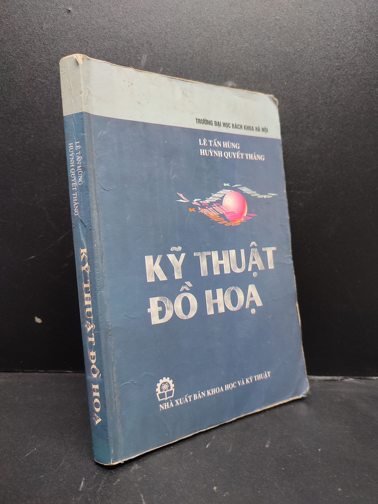 Kỹ thuật đồ họa năm 2002 mới 70% ố vàng ẩm có viết HCM.TN2602