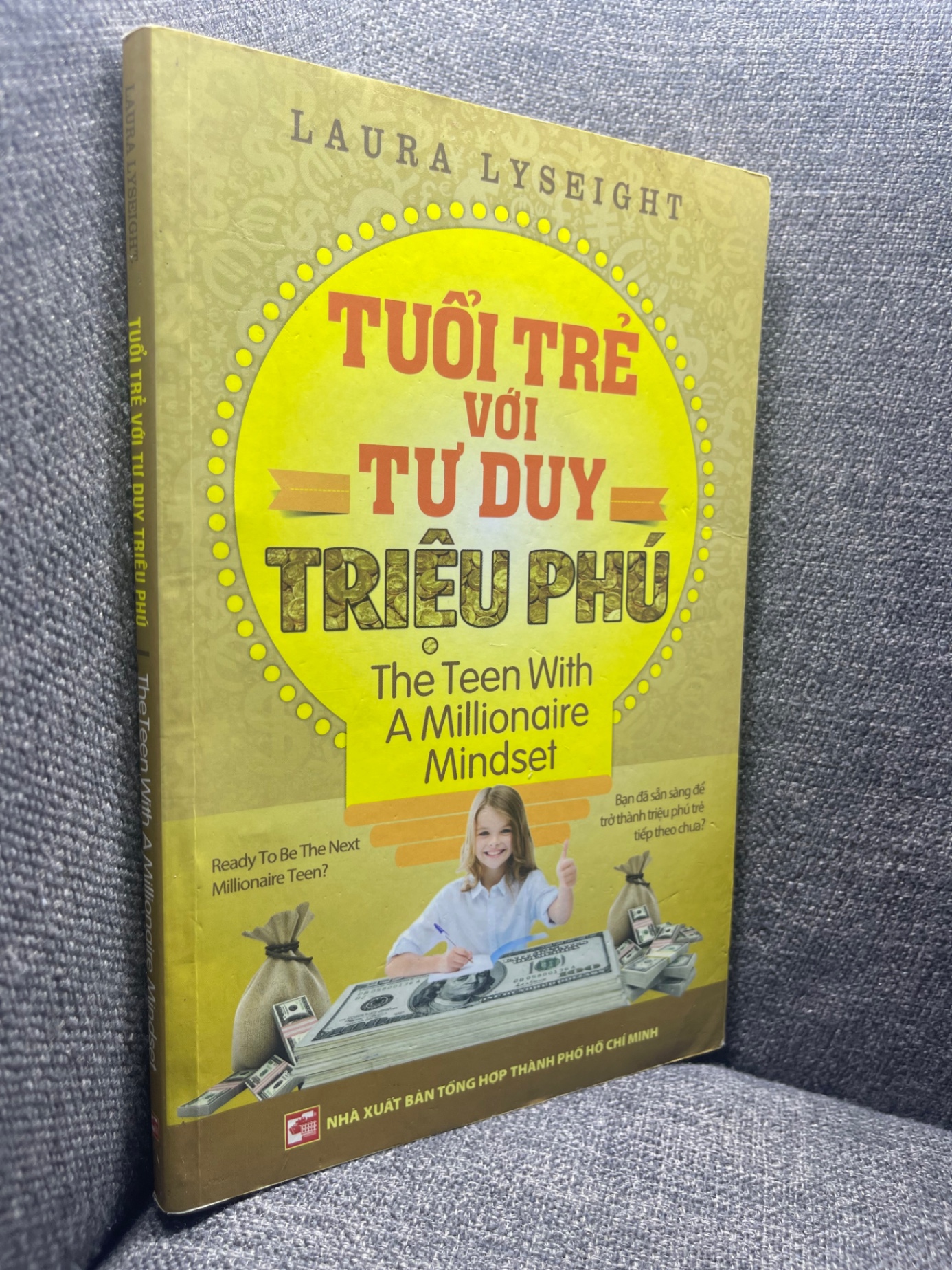 Tuổi trẻ với tư duy triệu phú Laura Lyseight 2014 mới 80% ố nhẹ HPB1704