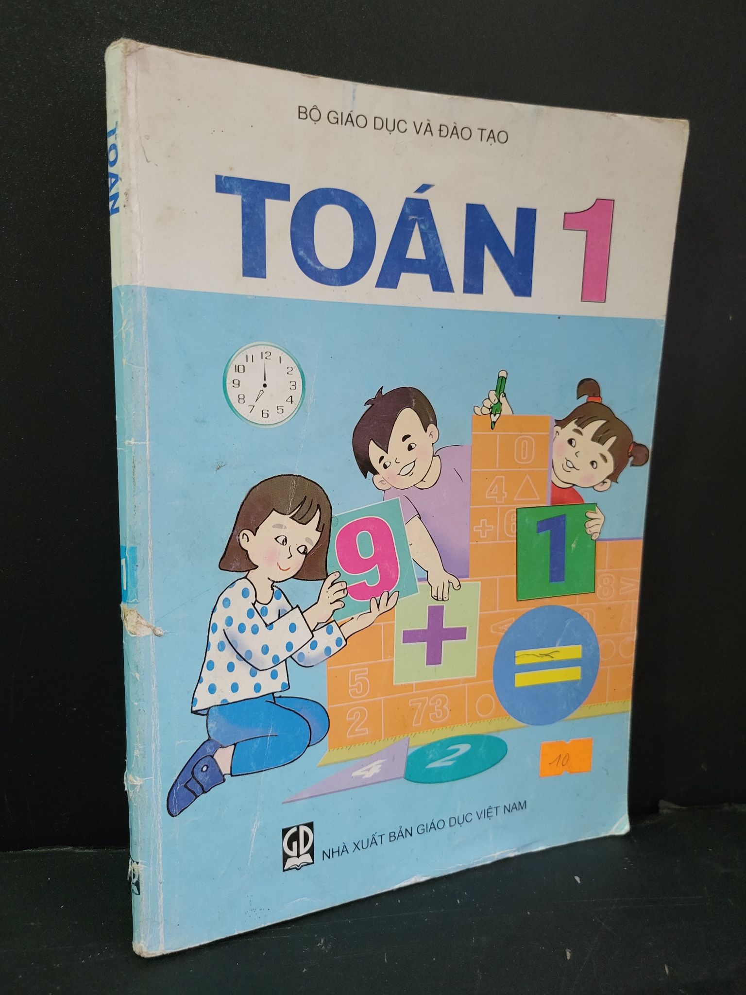Toán 1 mới 70% bẩn bìa, tróc gáy, rách bìa, có vết bút bi vẽ, có chữ viết ít 2019 Bộ giáo dục và đào tạo HCM3004 GIÁO KHOA