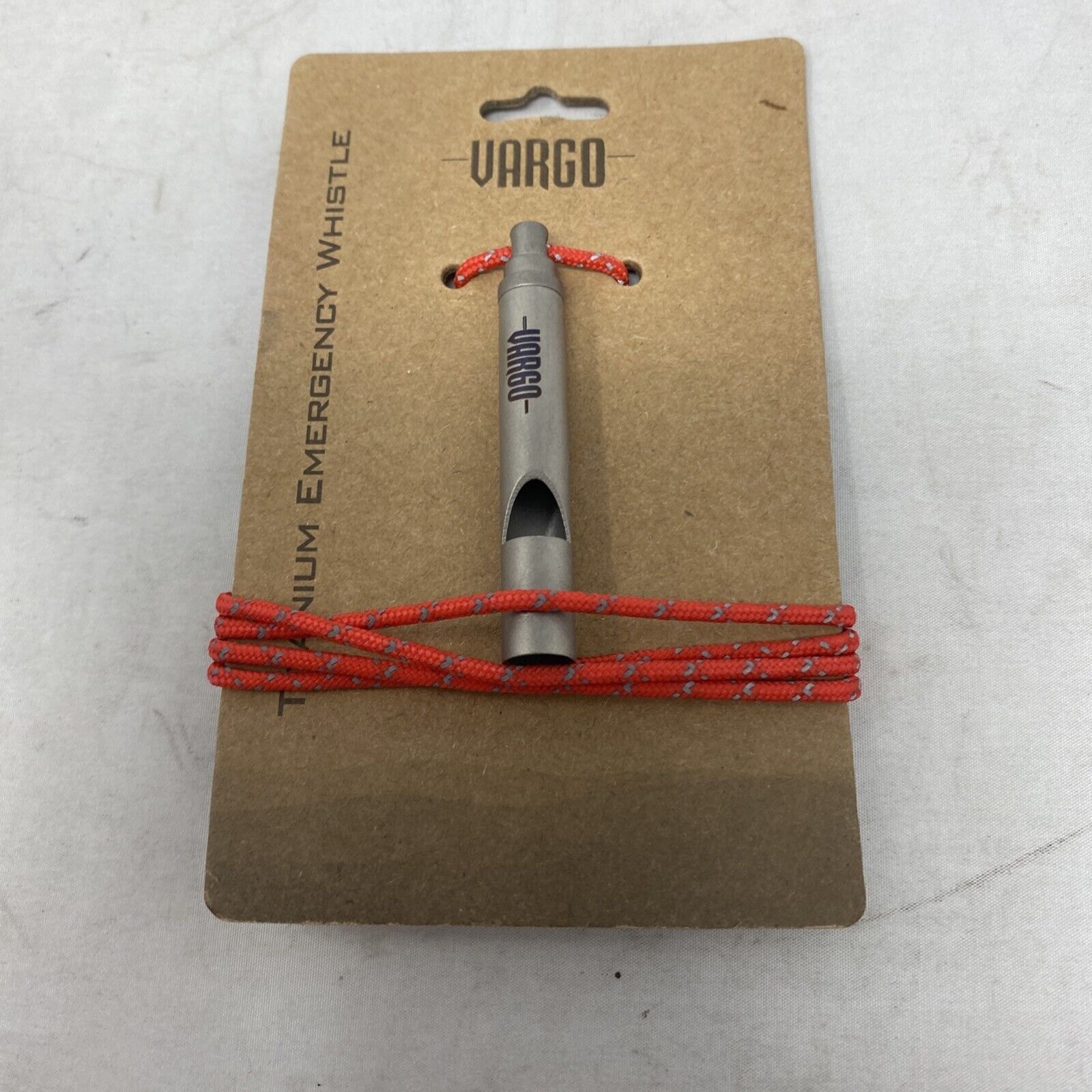 Vargo - Còi Titanium kèm dây đeo màu đỏ ( T-416 - Titanium Emergency Whistle)