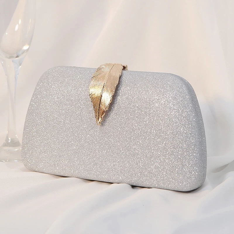 Túi cầm tay dự tiệc sang trọng khoá chiếc lá bling bling TX072