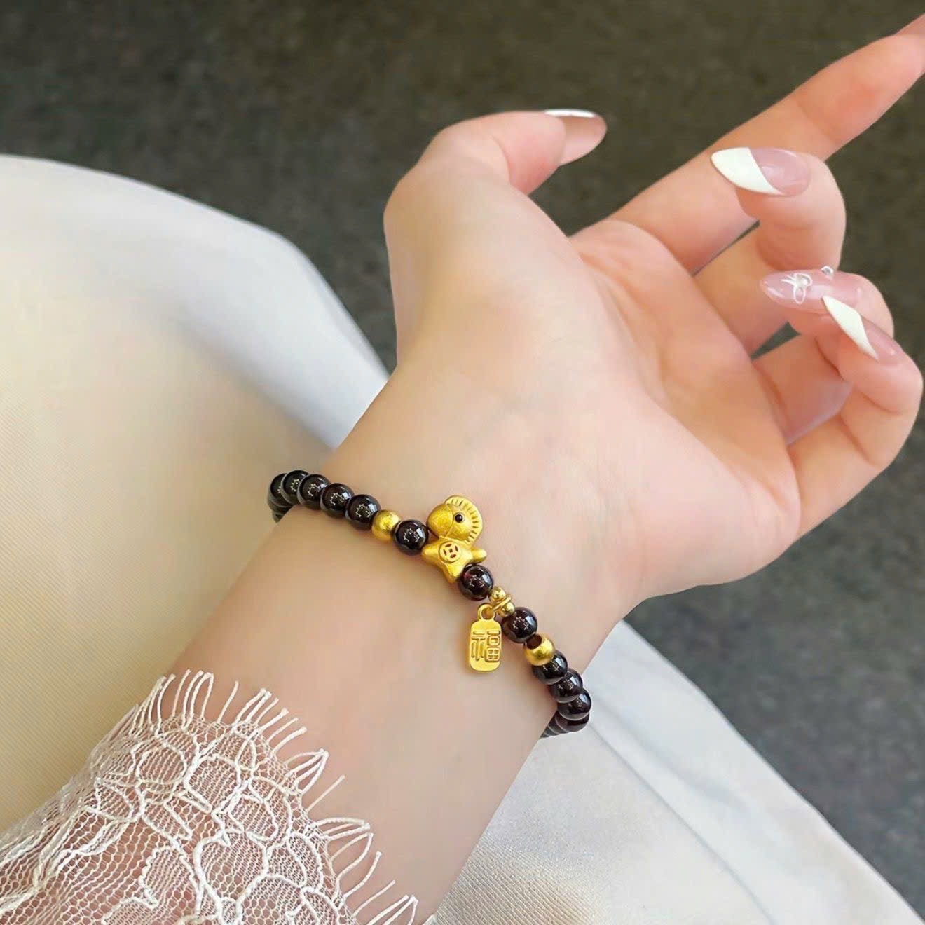 VÒNG TAY ĐÁ THẠCH LỰU HÌNH NGỰA