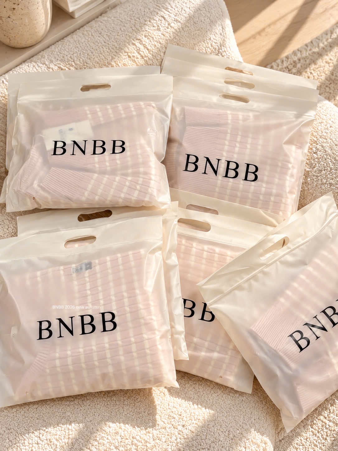 ÁO LEN KẺ HỒNG BNBB CỘC TAY