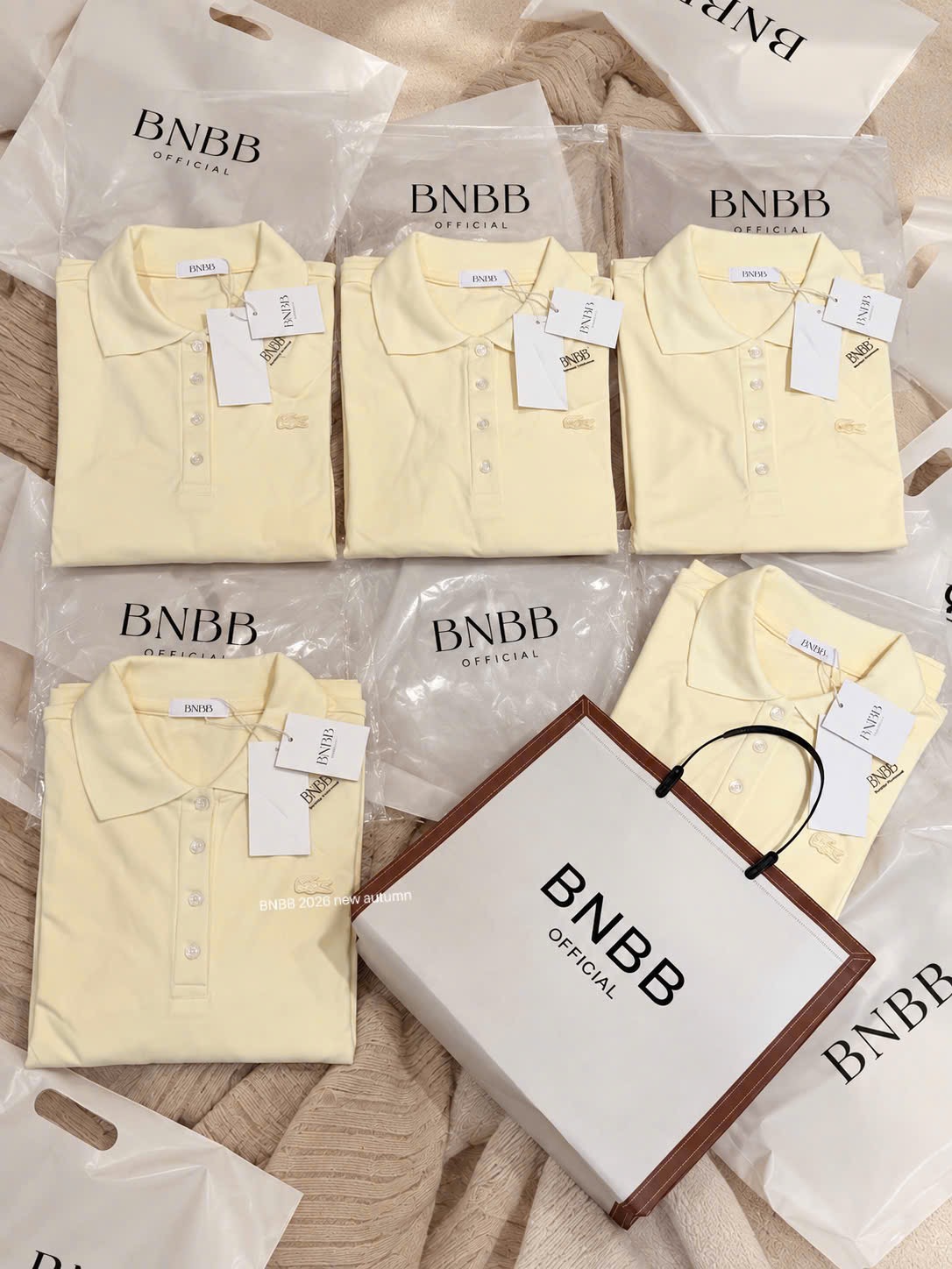 Gom - ÁO POLO VÀNG DÀI TAY THÊU CÁ SẤU BNBB
