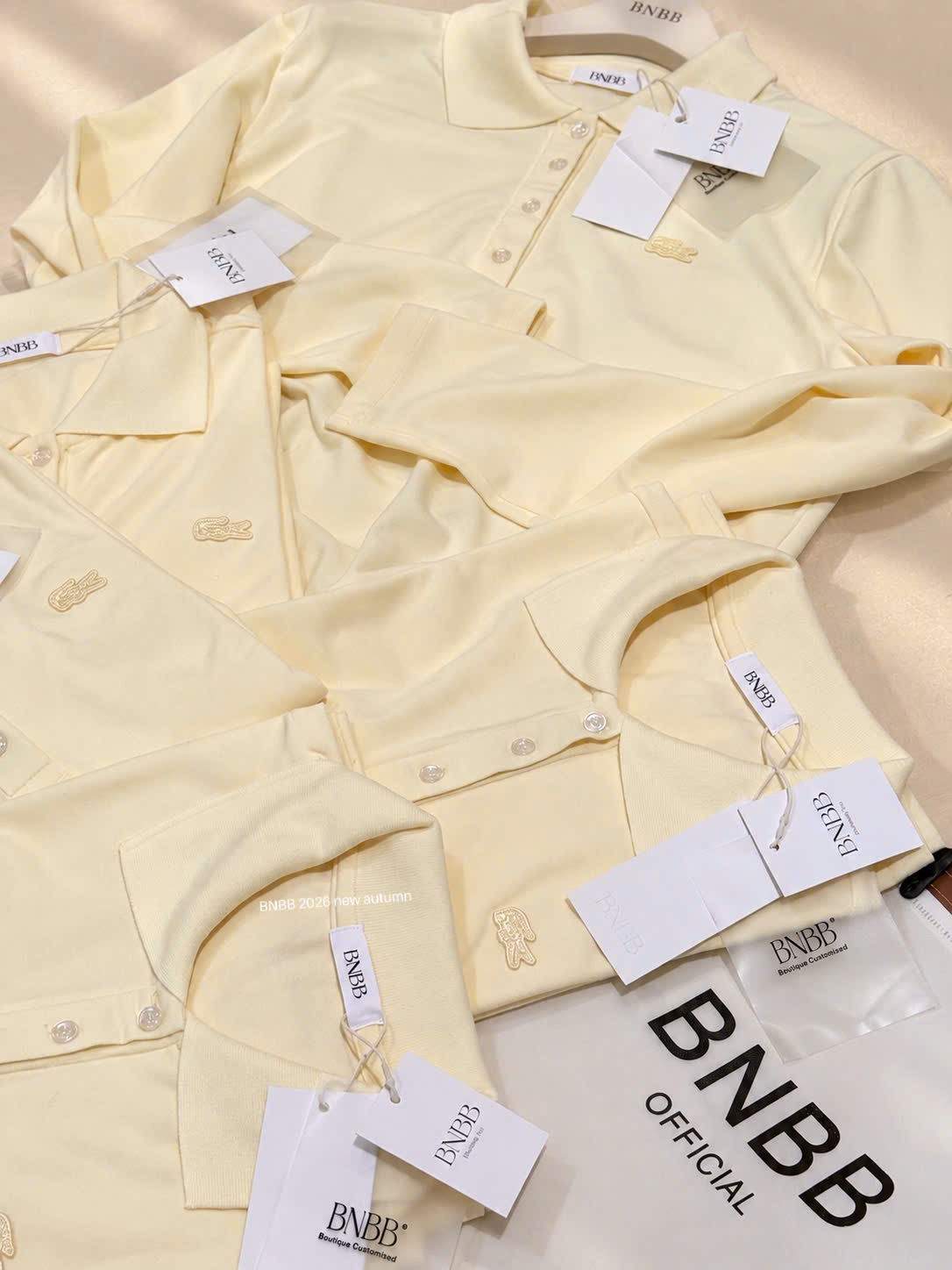 Gom - ÁO POLO VÀNG DÀI TAY THÊU CÁ SẤU BNBB