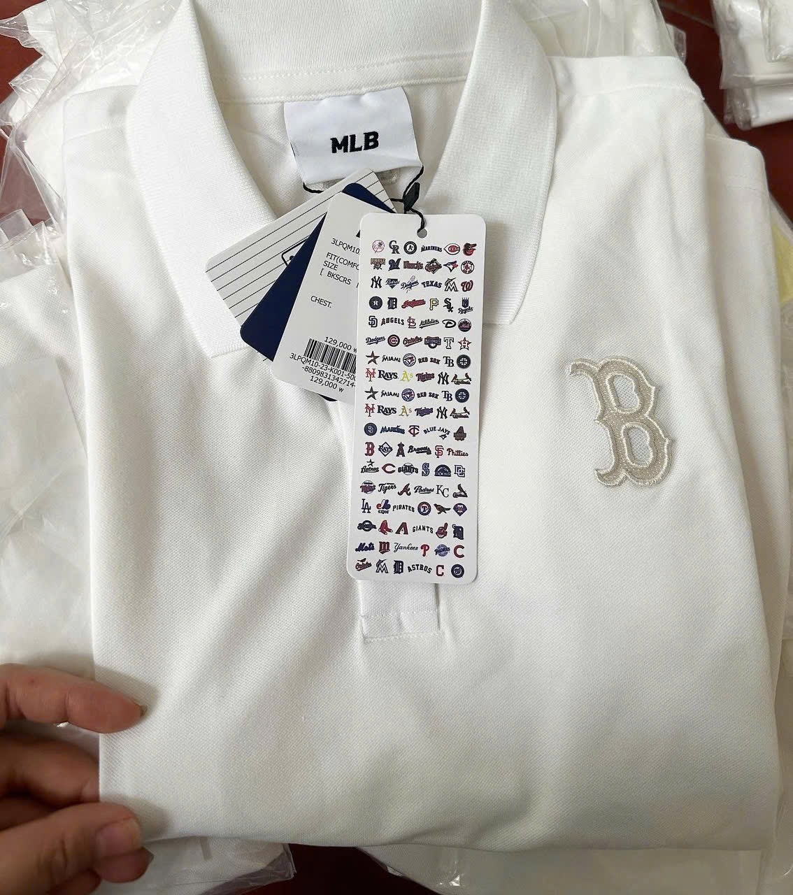 Hàng nhà máy - ÁO POLO TRẮNG THÊU CHỮ B CỘC TAY