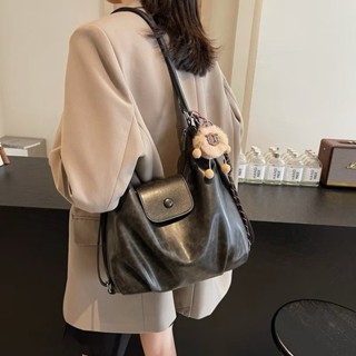 TÚI TRƠN KÉO KHOÁ BẤM MẮT KHÓC - Đen