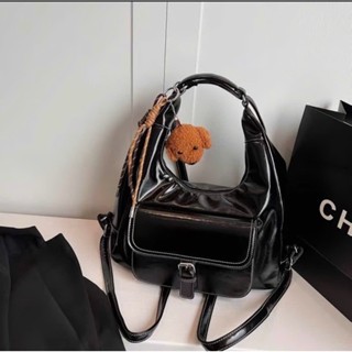 TÚI ĐEO VAI BALO CHỈ TRẮNG KHOÁ CÀI CÚN NÂU - Đen