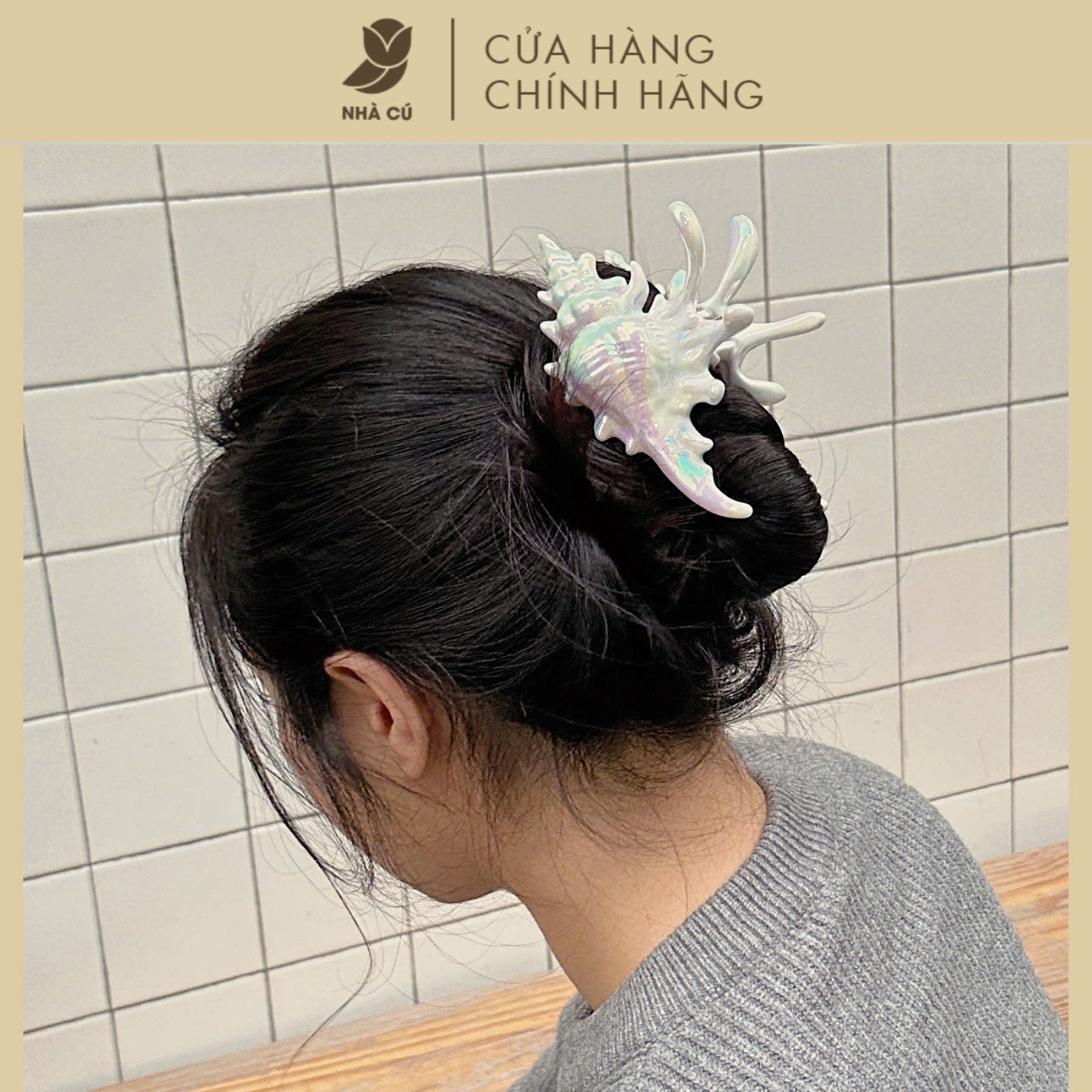 KẸP TÓC VỎ ỐC ÁNH HOLO 6123