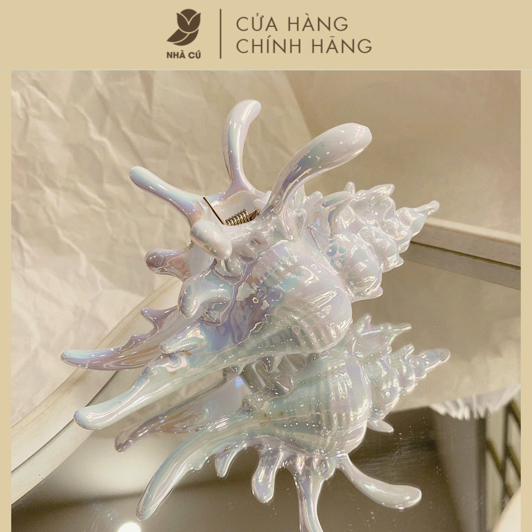 KẸP TÓC VỎ ỐC ÁNH HOLO 6123