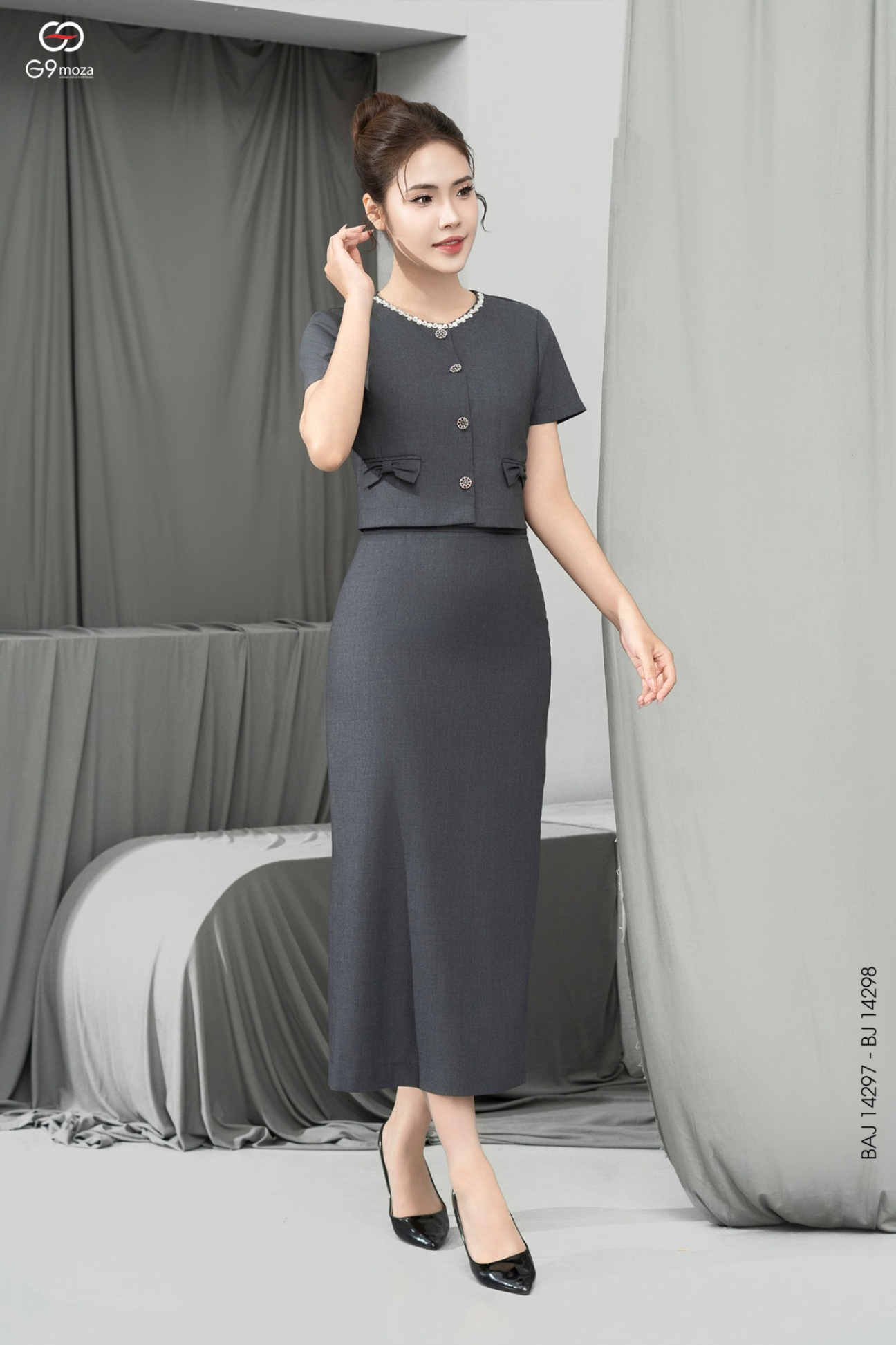 Chân váy midi dáng ôm xẻ tà sau 25S16BJ14298-1