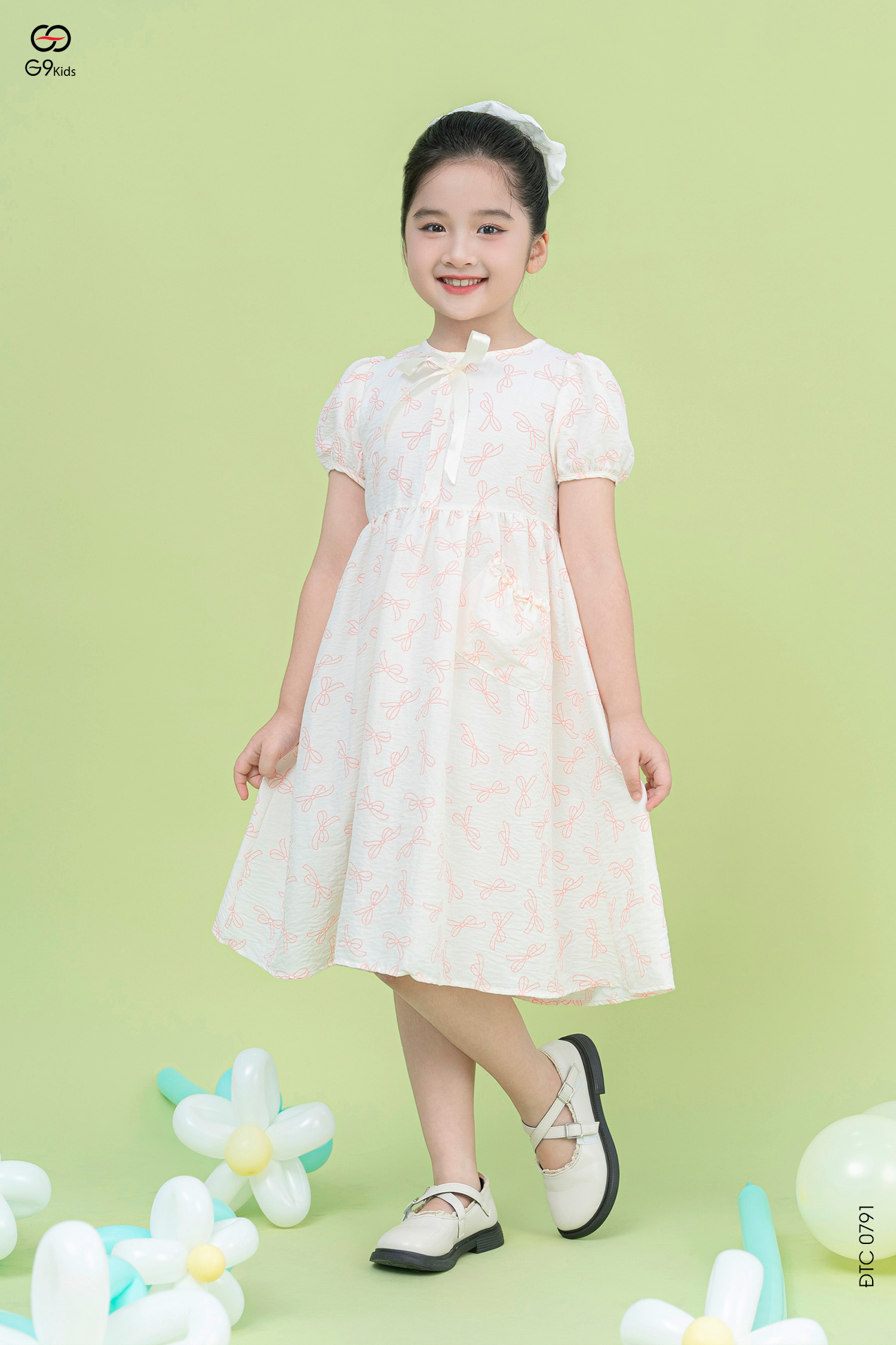 Váy liền tay cộc phối nơ cổ cho bé gái 25S51BĐTC0791-1