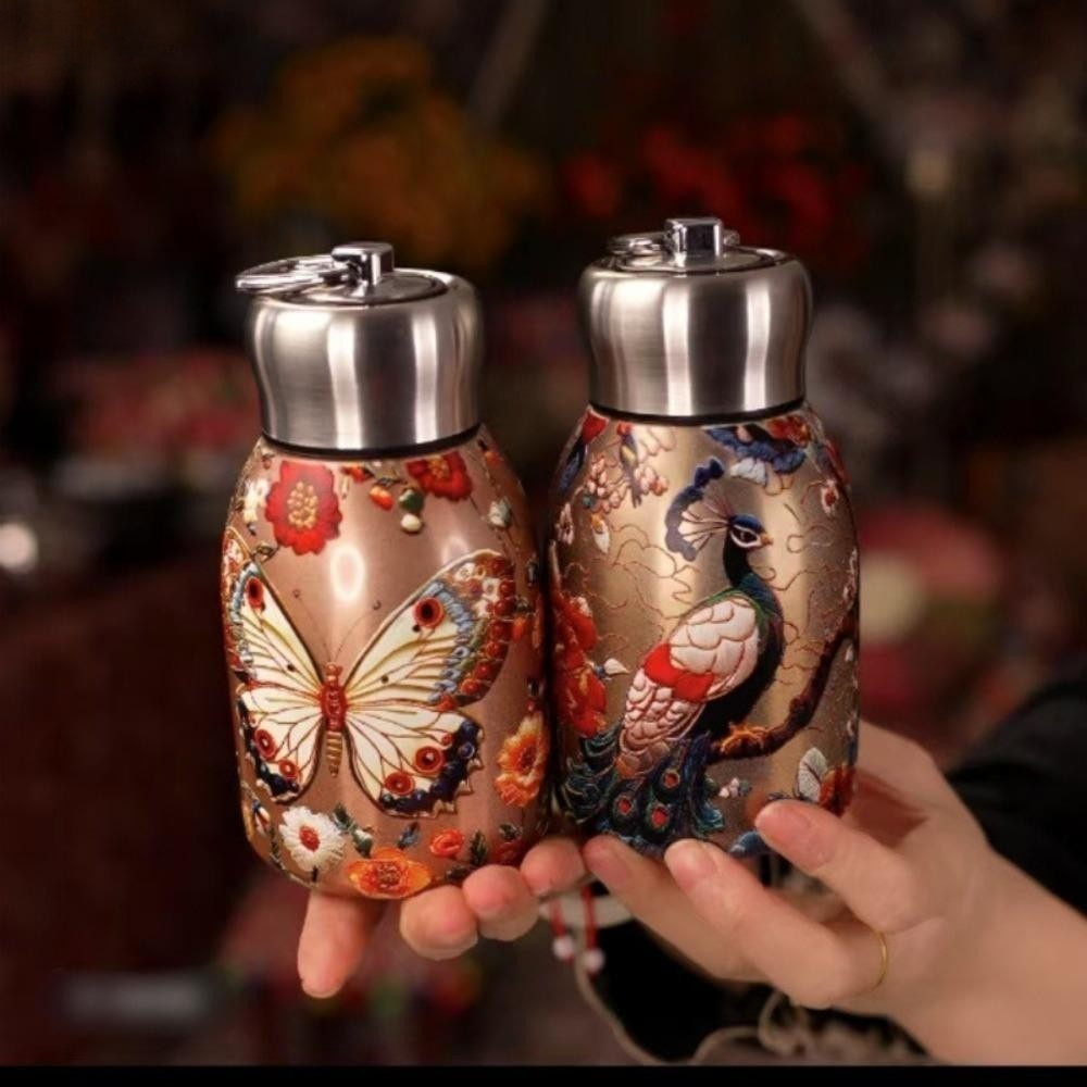 Bình bom họa tiết công bướm