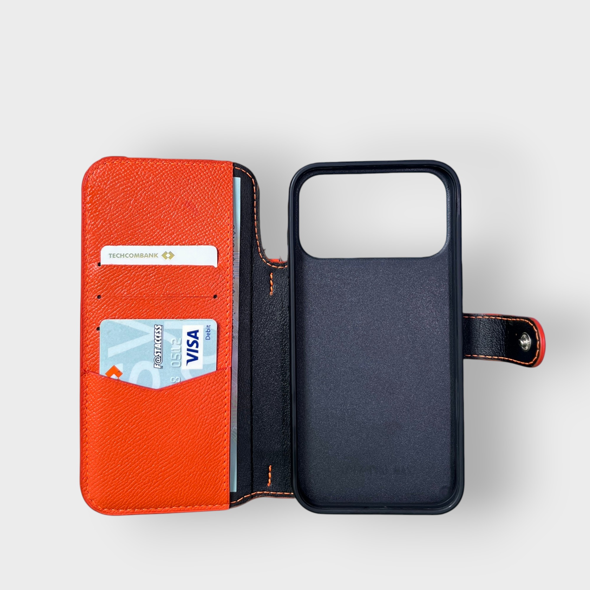 LS0288 - Bao da thủ công viền đen Flip kèm khe thẻ handtsrap quai cài kèm dây đeo - Epsom - E11 Cam - 17 Pro